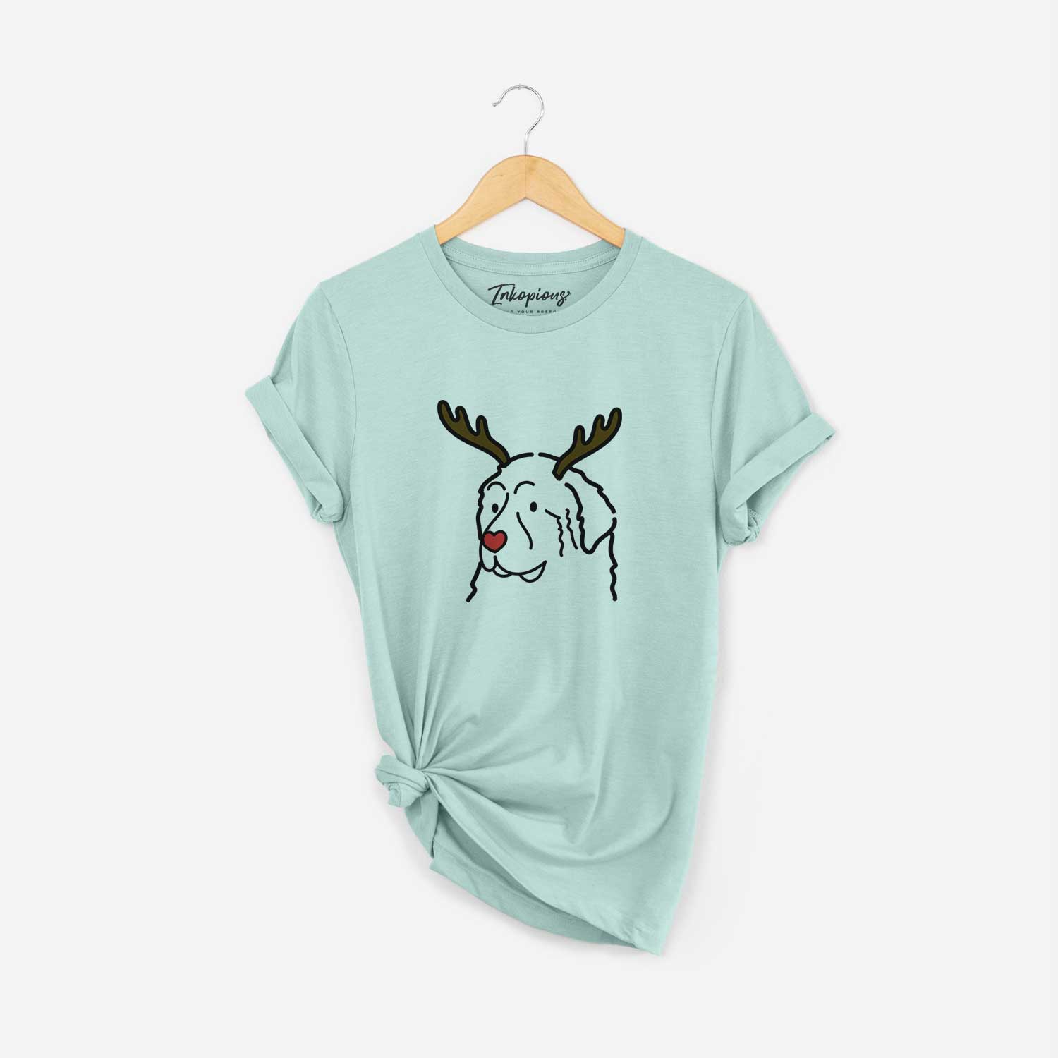 Minimalist line drawing of a Great Pyrenees with reindeer antlers and a red nose on a Heather Sage Unisex crewneck