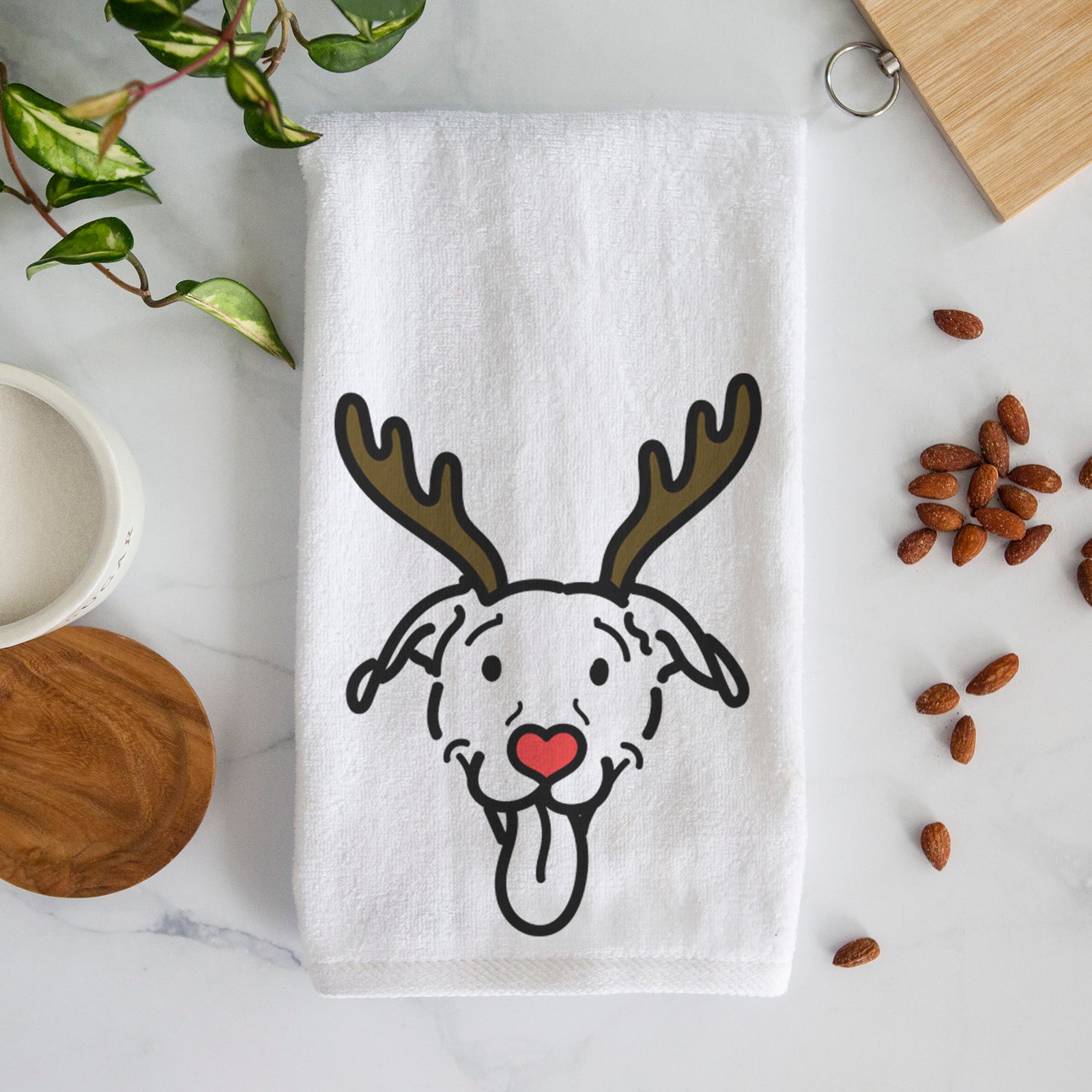 Minimalist line drawing of Hemi the Pitbull Mix with reindeer antlers and a red nose on a decorative hand towel