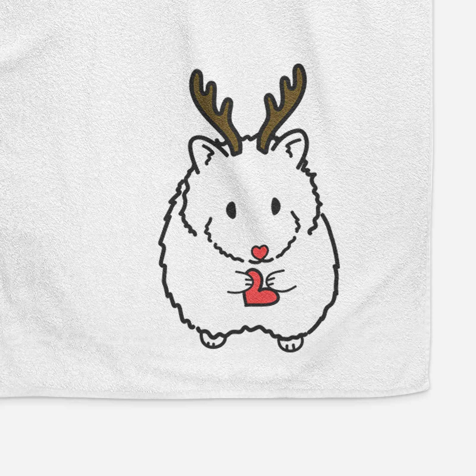 Minimalist line drawing of Hilga the Hamster with reindeer antlers and a red nose on a decorative hand towel