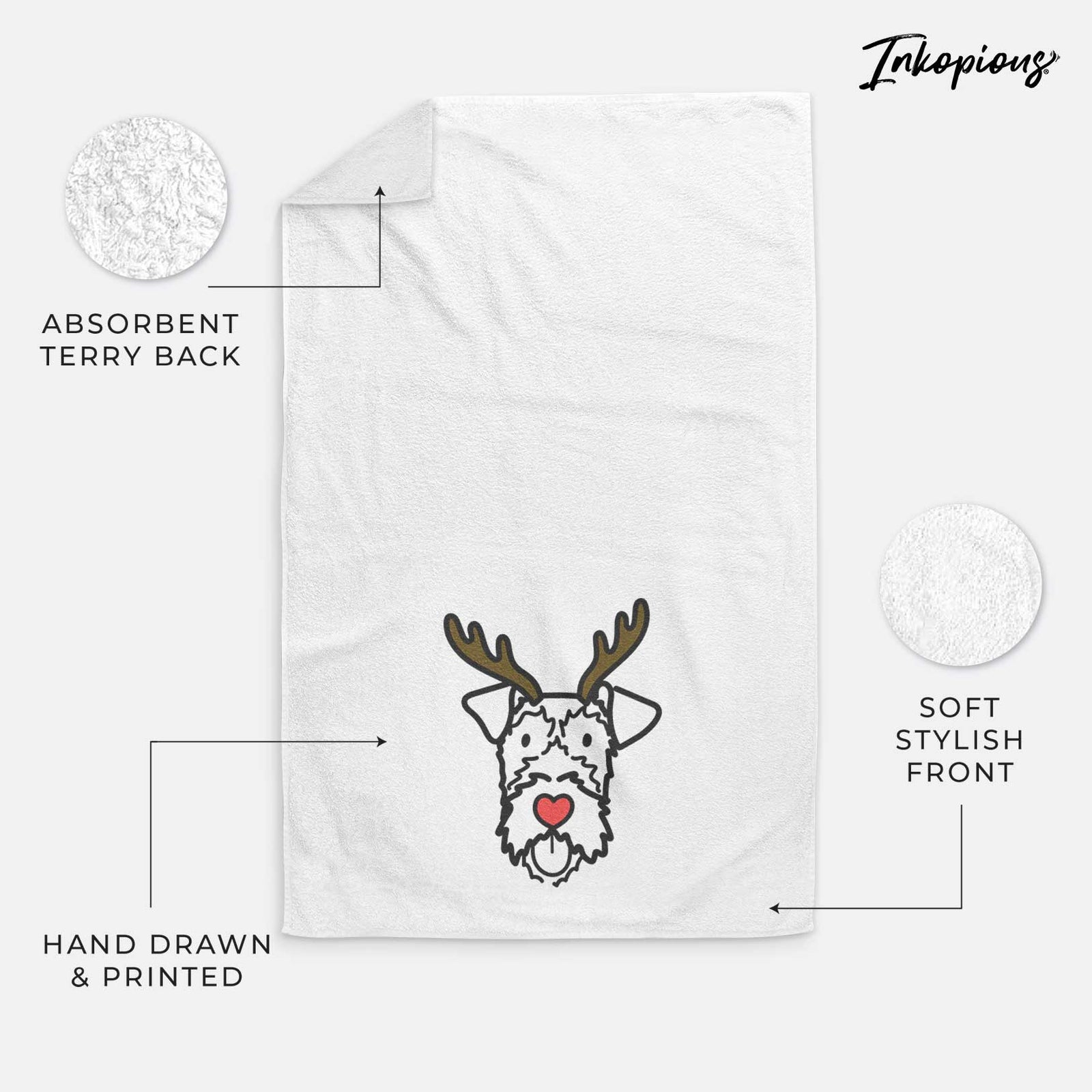 Minimalist line drawing of an Irish Terrier with reindeer antlers and a red nose on a decorative hand towel
