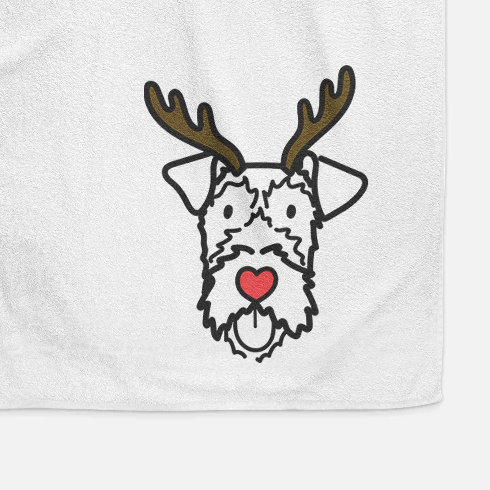 Minimalist line drawing of an Irish Terrier with reindeer antlers and a red nose on a decorative hand towel