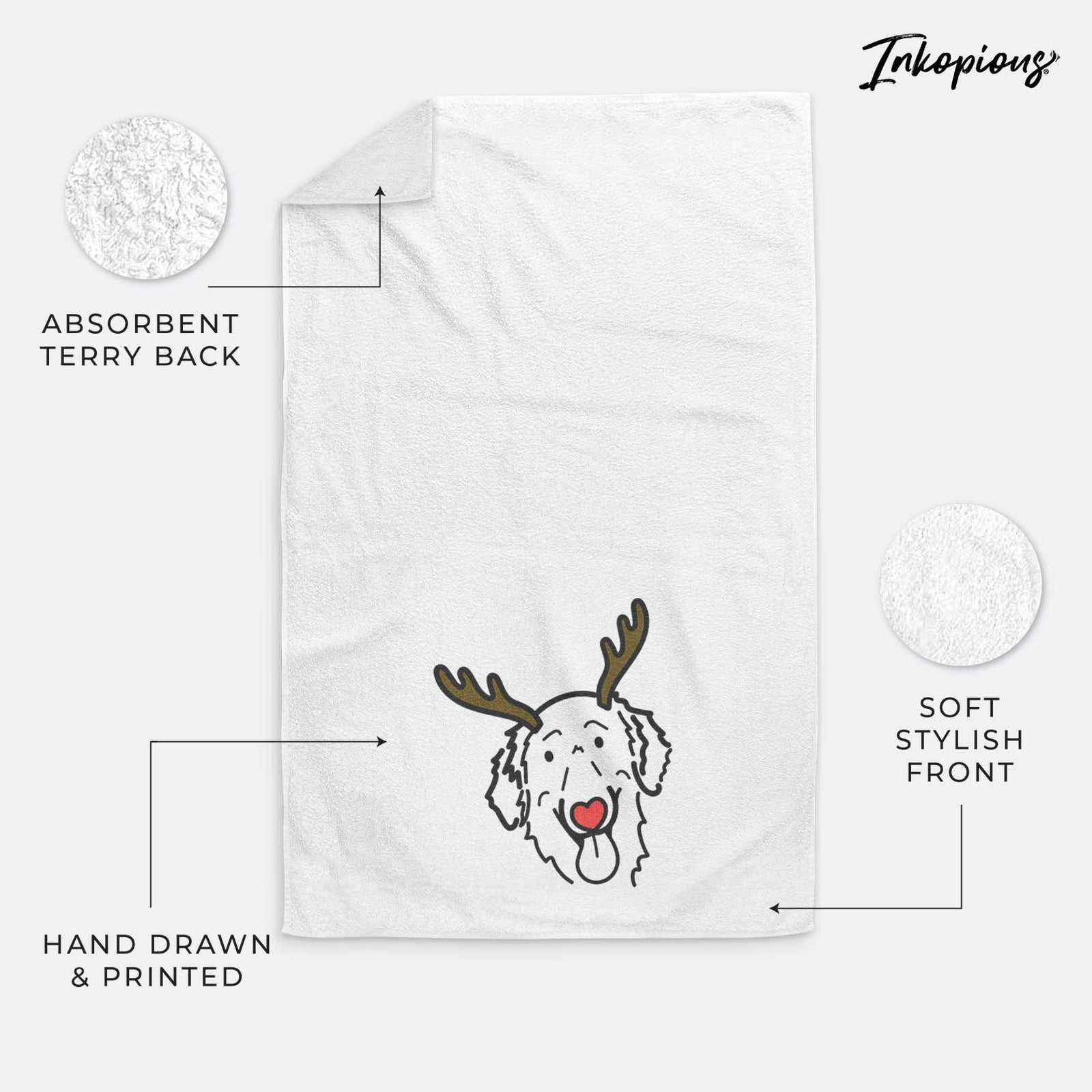 Minimalist line drawing of Jack the Flat-Coated Retriever with reindeer antlers and a red nose on a decorative hand towel