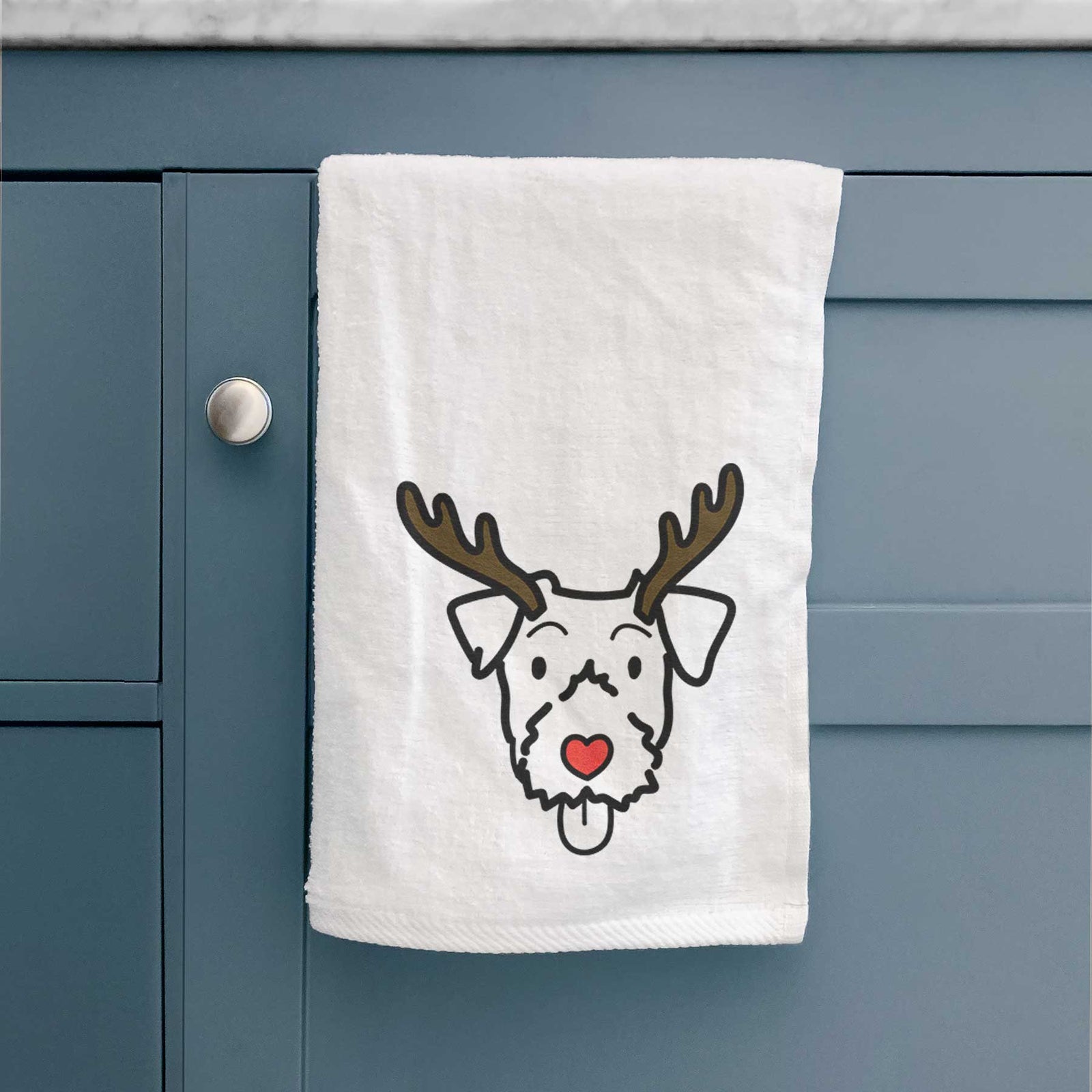 Minimalist line drawing of a Jack Russell Terrier with reindeer antlers and a red nose on a decorative hand towel