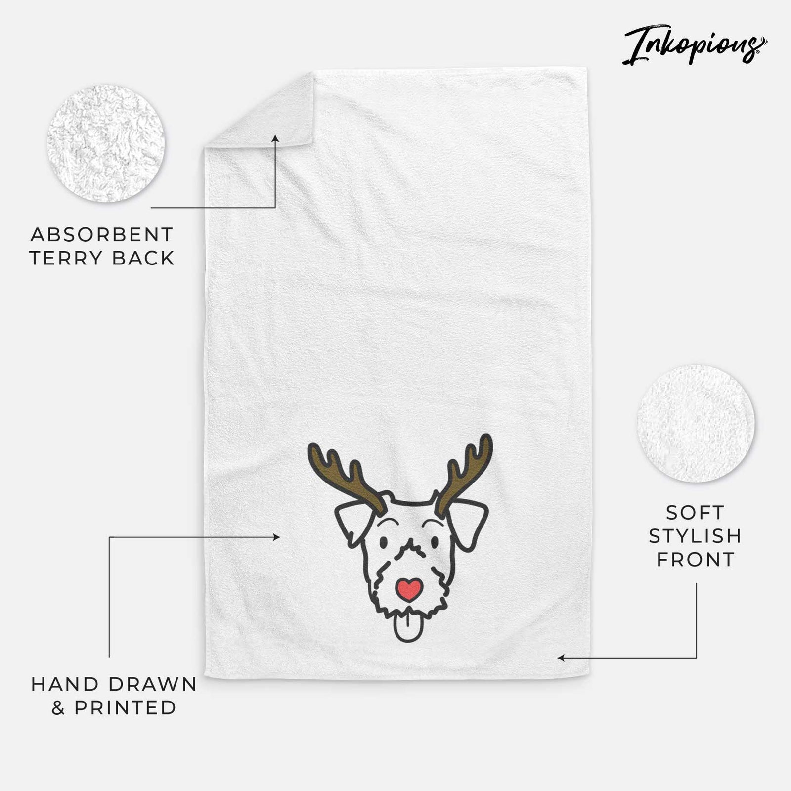 Minimalist line drawing of a Jack Russell Terrier with reindeer antlers and a red nose on a decorative hand towel