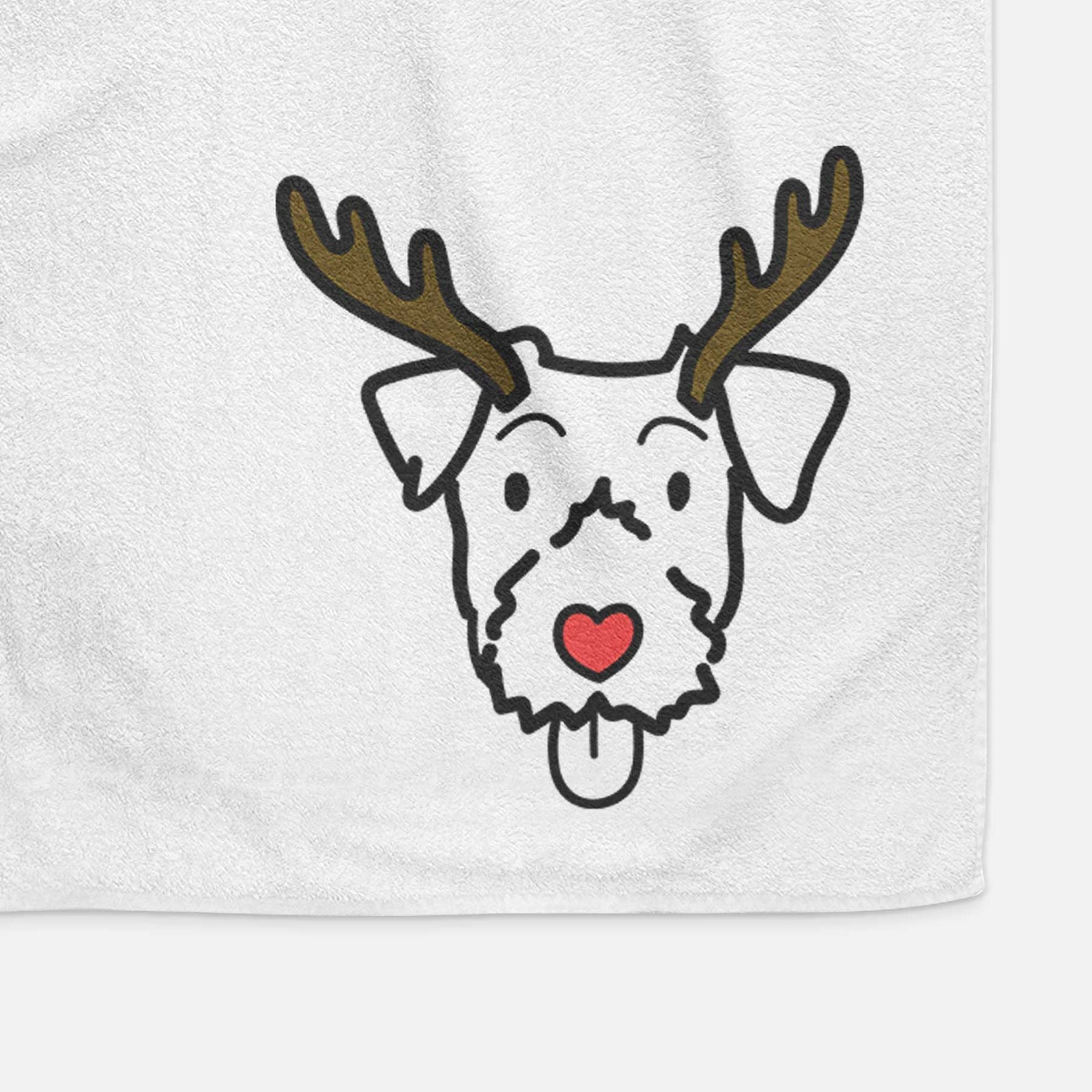 Minimalist line drawing of a Jack Russell Terrier with reindeer antlers and a red nose on a decorative hand towel