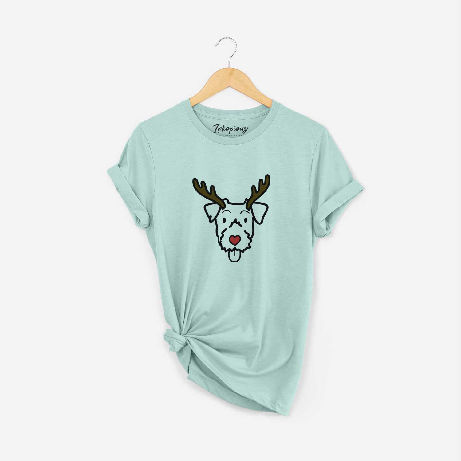 Minimalist line drawing of a Jack Russell Terrier with reindeer antlers and a red nose on a Heather Sage Unisex crewneck
