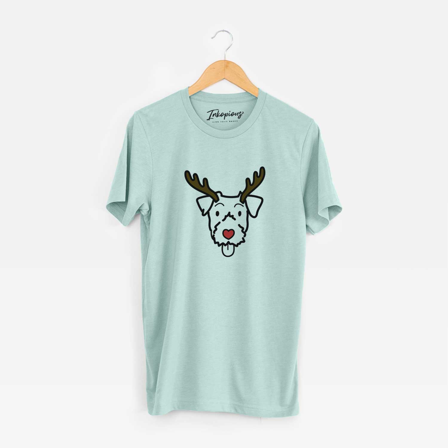 Minimalist line drawing of a Jack Russell Terrier with reindeer antlers and a red nose on a Heather Sage Unisex crewneck