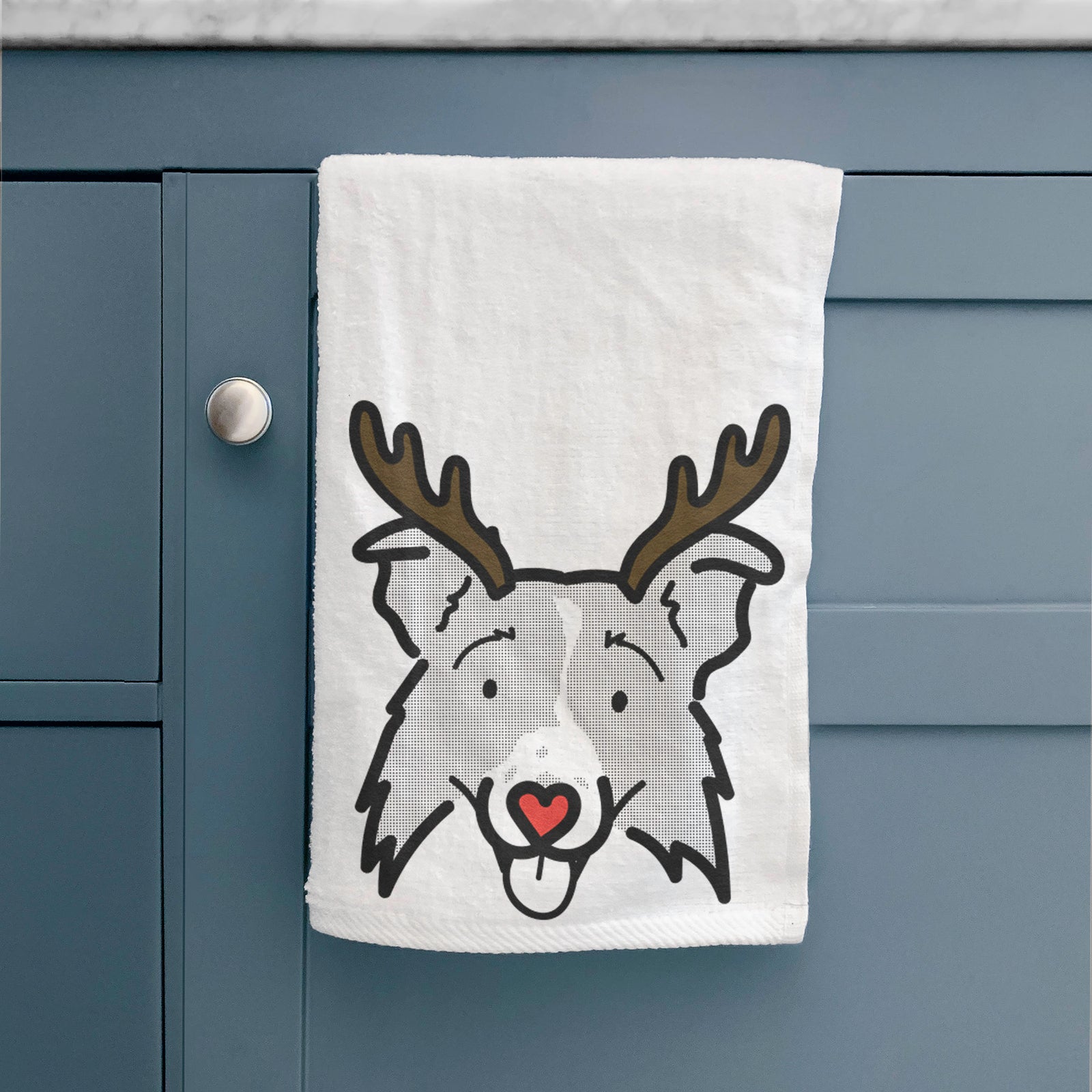 Minimalist line drawing of Jam the Border Collie 2.0 with reindeer antlers and a red nose on a decorative hand towel