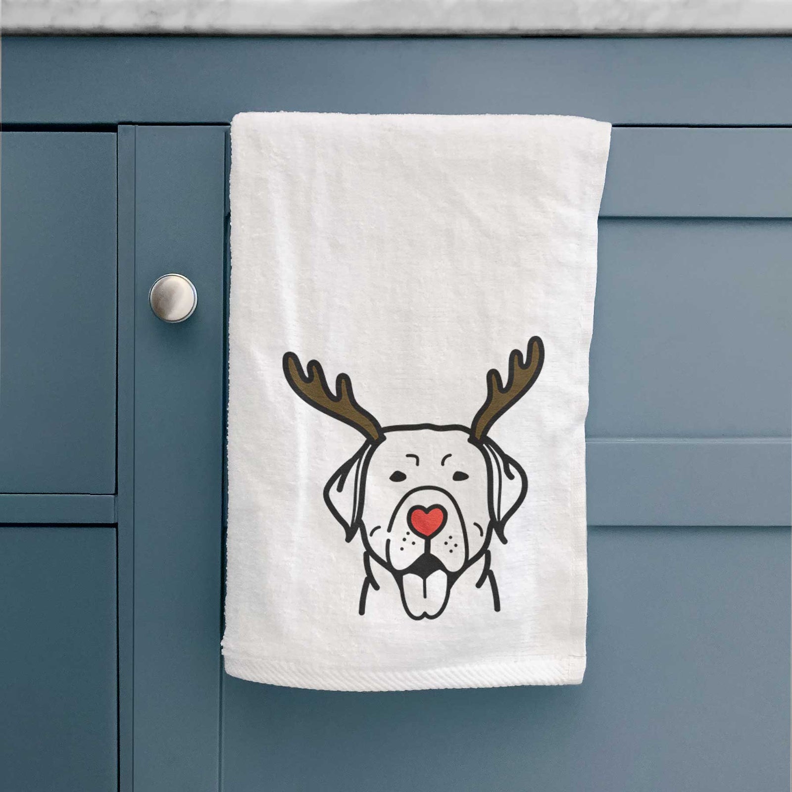 Minimalist line drawing of a Labrador Retriever with reindeer antlers and a red nose on a decorative hand towel