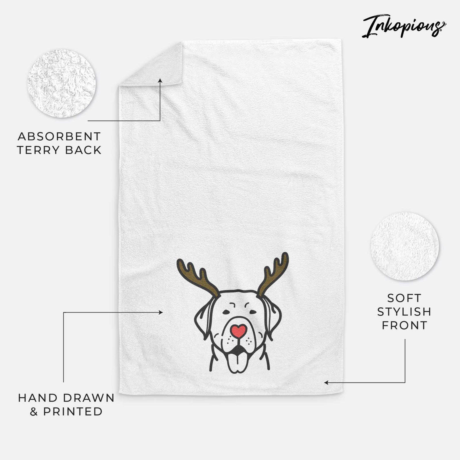 Minimalist line drawing of a Labrador Retriever with reindeer antlers and a red nose on a decorative hand towel