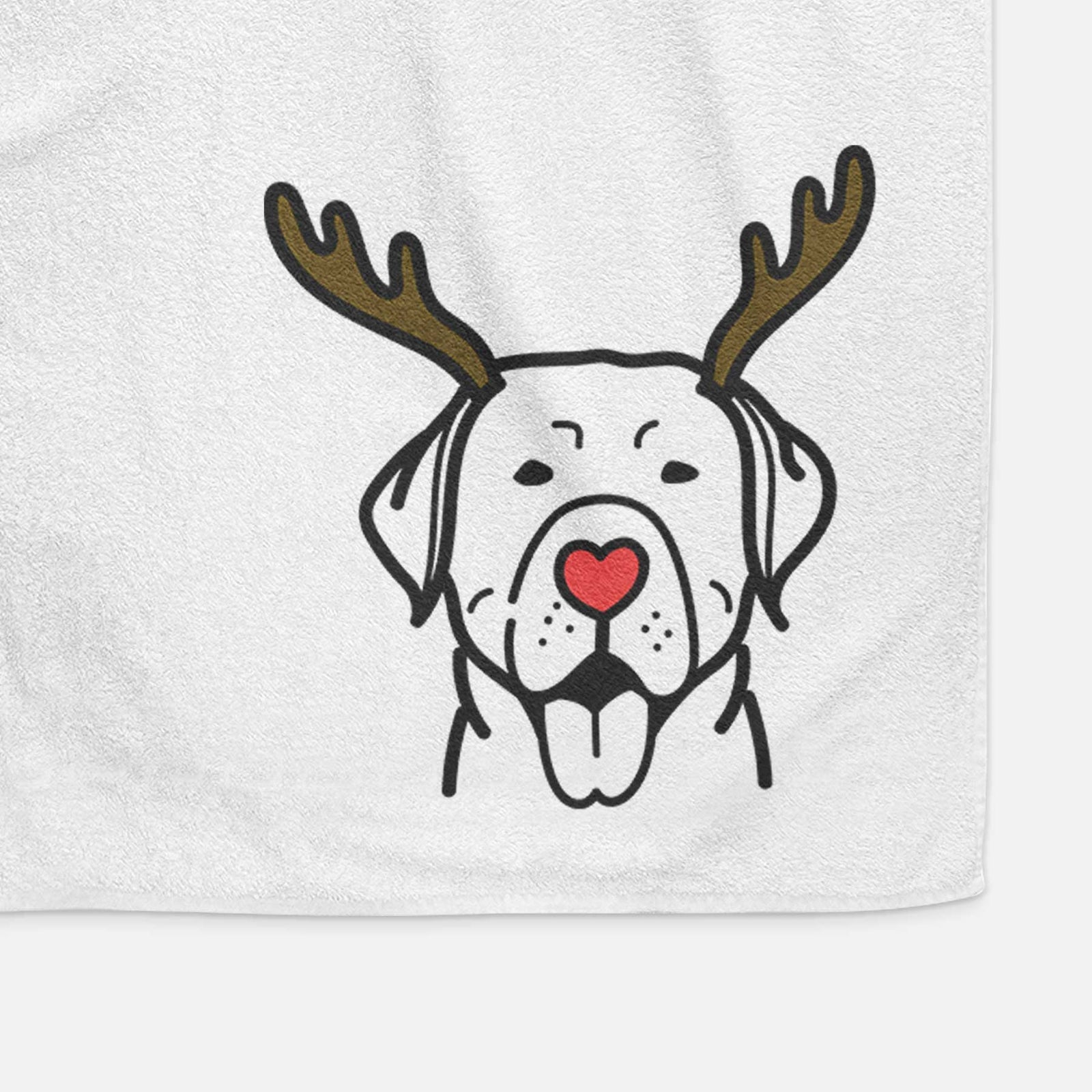 Minimalist line drawing of a Labrador Retriever with reindeer antlers and a red nose on a decorative hand towel
