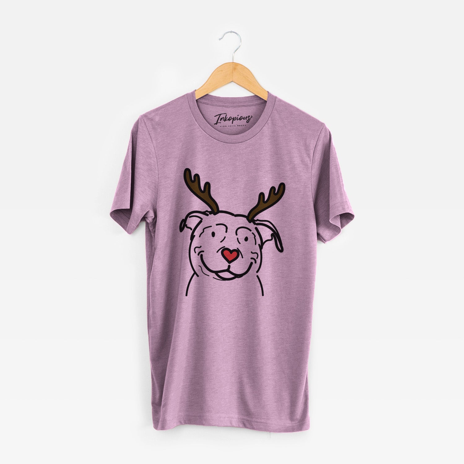 Minimalist line drawing of Lady the American Pitbull Terrier with reindeer antlers and a red nose on an Orchid Unisex crewneck