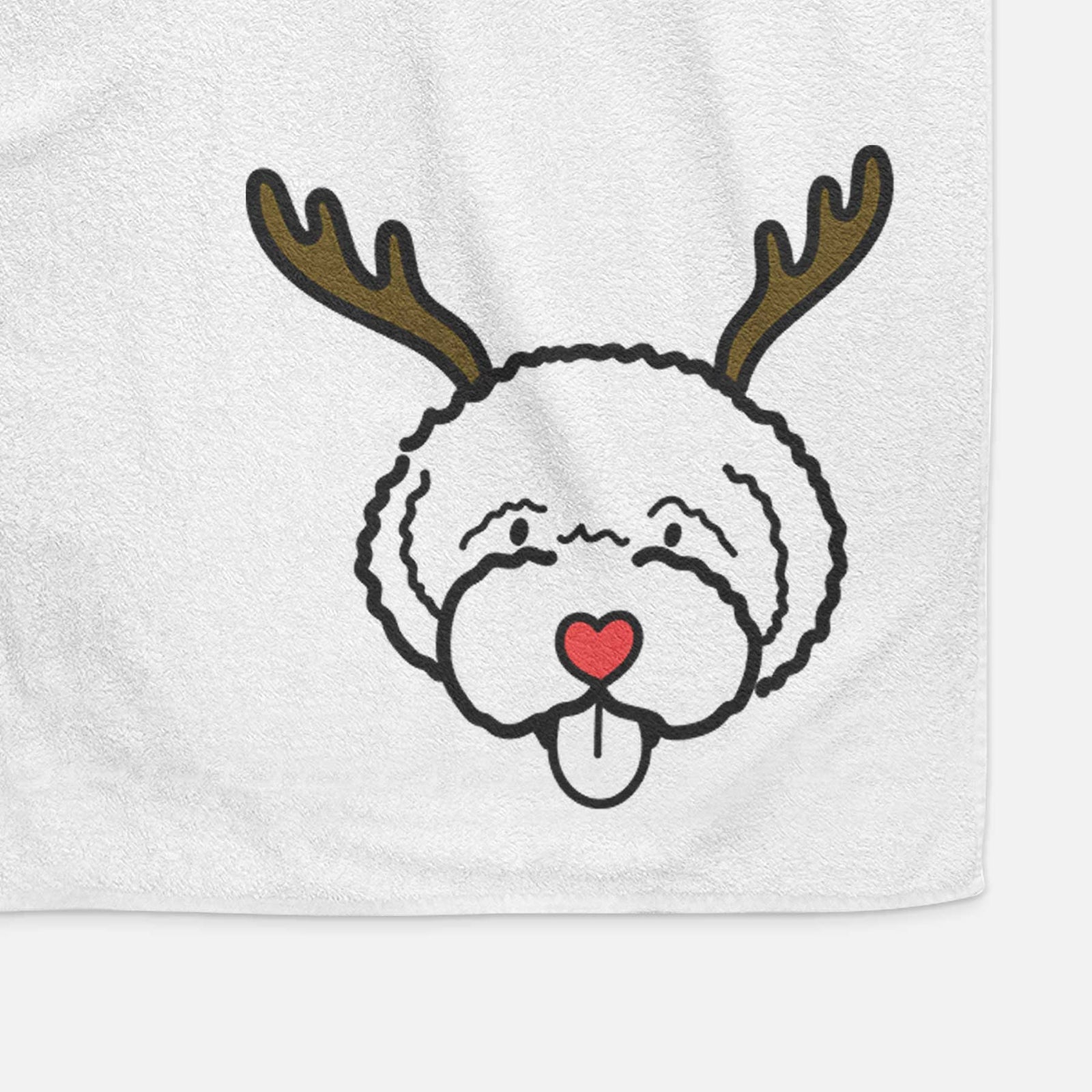 Minimalist line drawing of a Lagotta Romagnolo with reindeer antlers and a red nose on a decorative hand towel