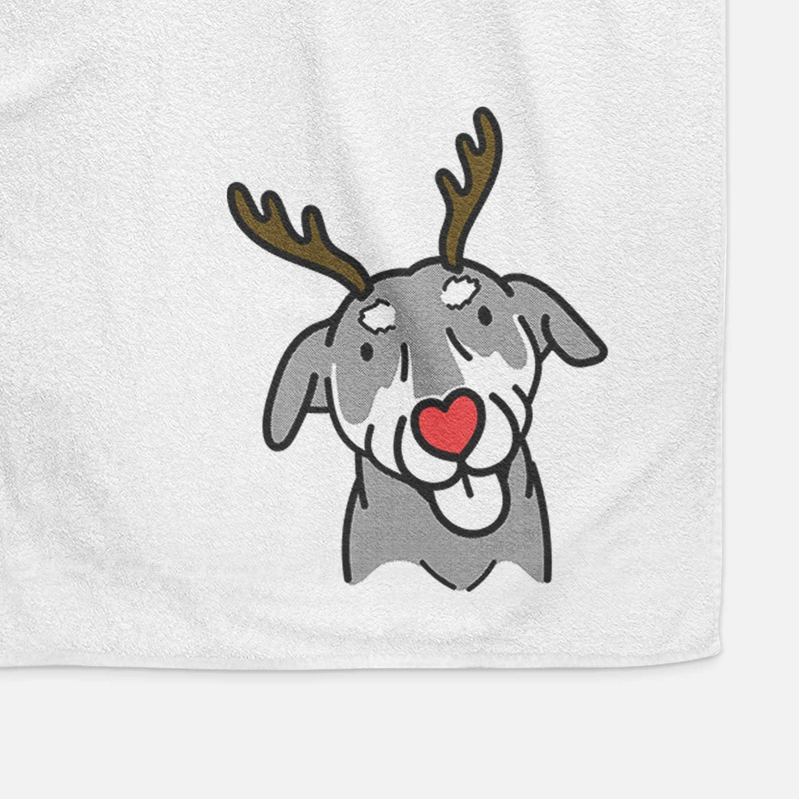 Minimalist line drawing of Lousia the Mixed Breed with reindeer antlers and a red nose on a decorative hand towel