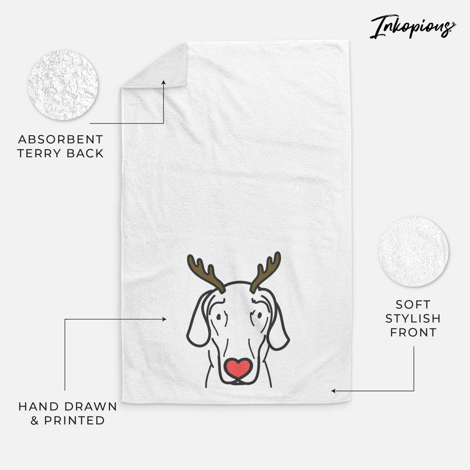 Minimalist line drawing of Lucy the Great Dane with reindeer antlers and a red nose on a decorative hand towel