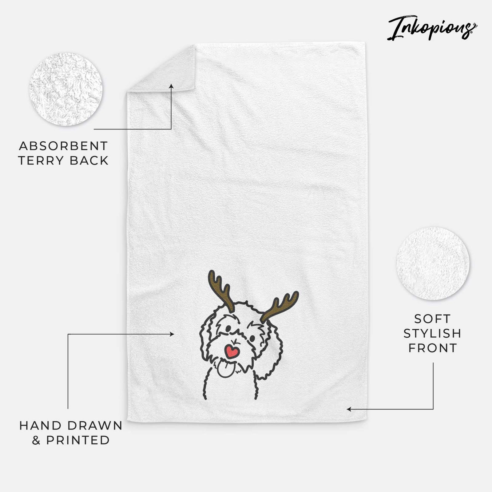 Minimalist line drawing of Mabel the Bernedoodle with reindeer antlers and a red nose on a decorative hand towel