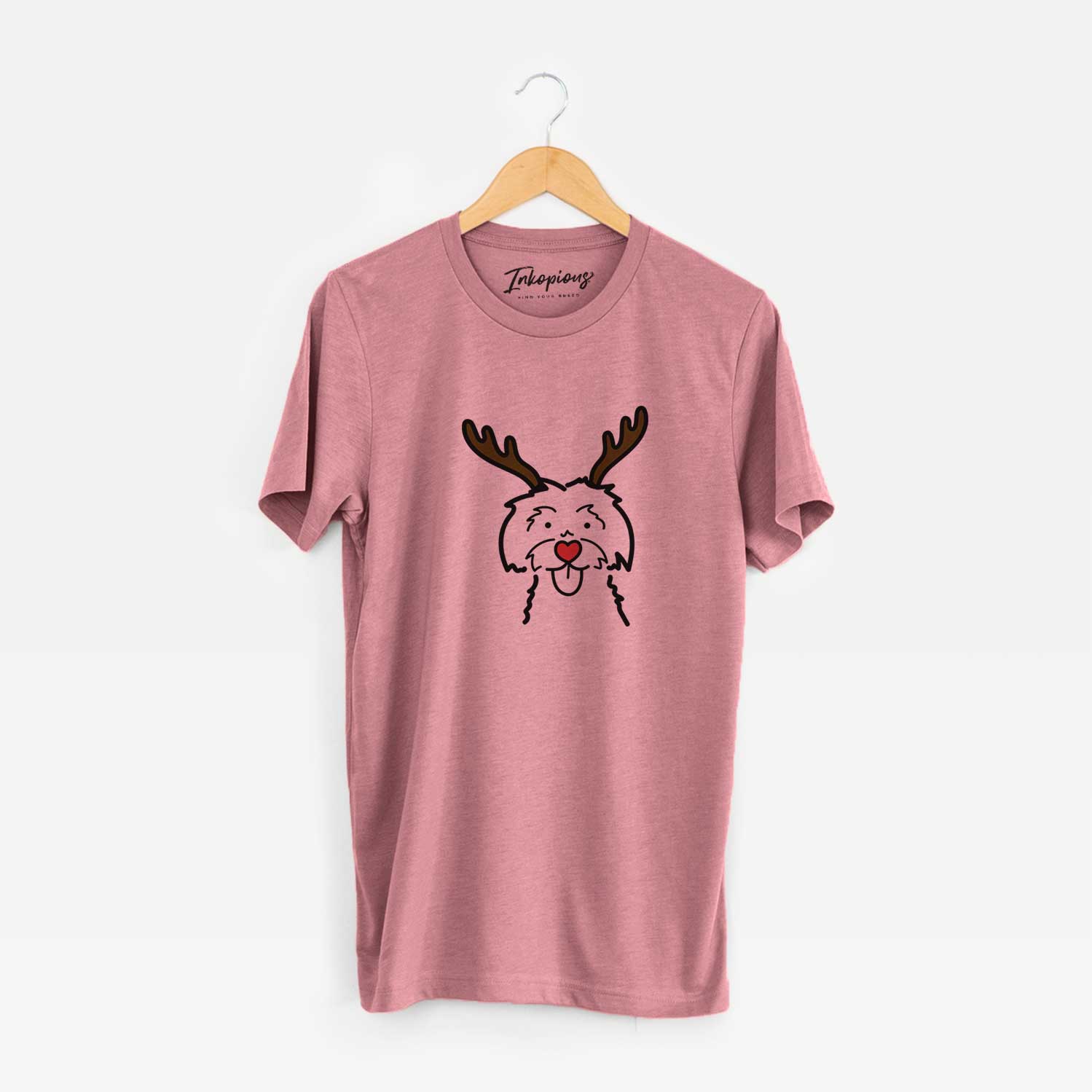 Minimalist line drawing of a Maltese with reindeer antlers and a red nose on a Mauve Unisex crewneck