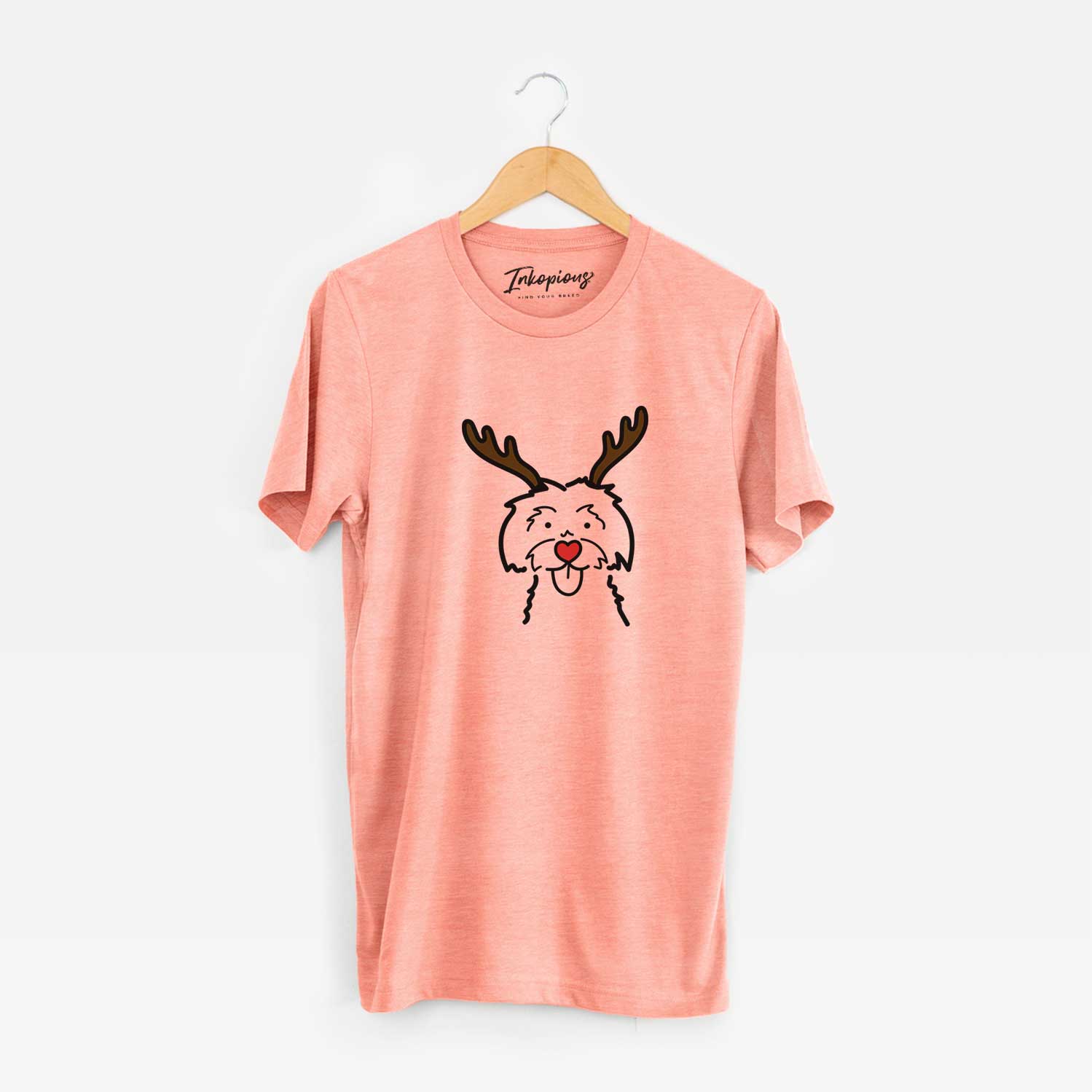 Minimalist line drawing of a Maltese with reindeer antlers and a red nose on a Sunset Unisex crewneck