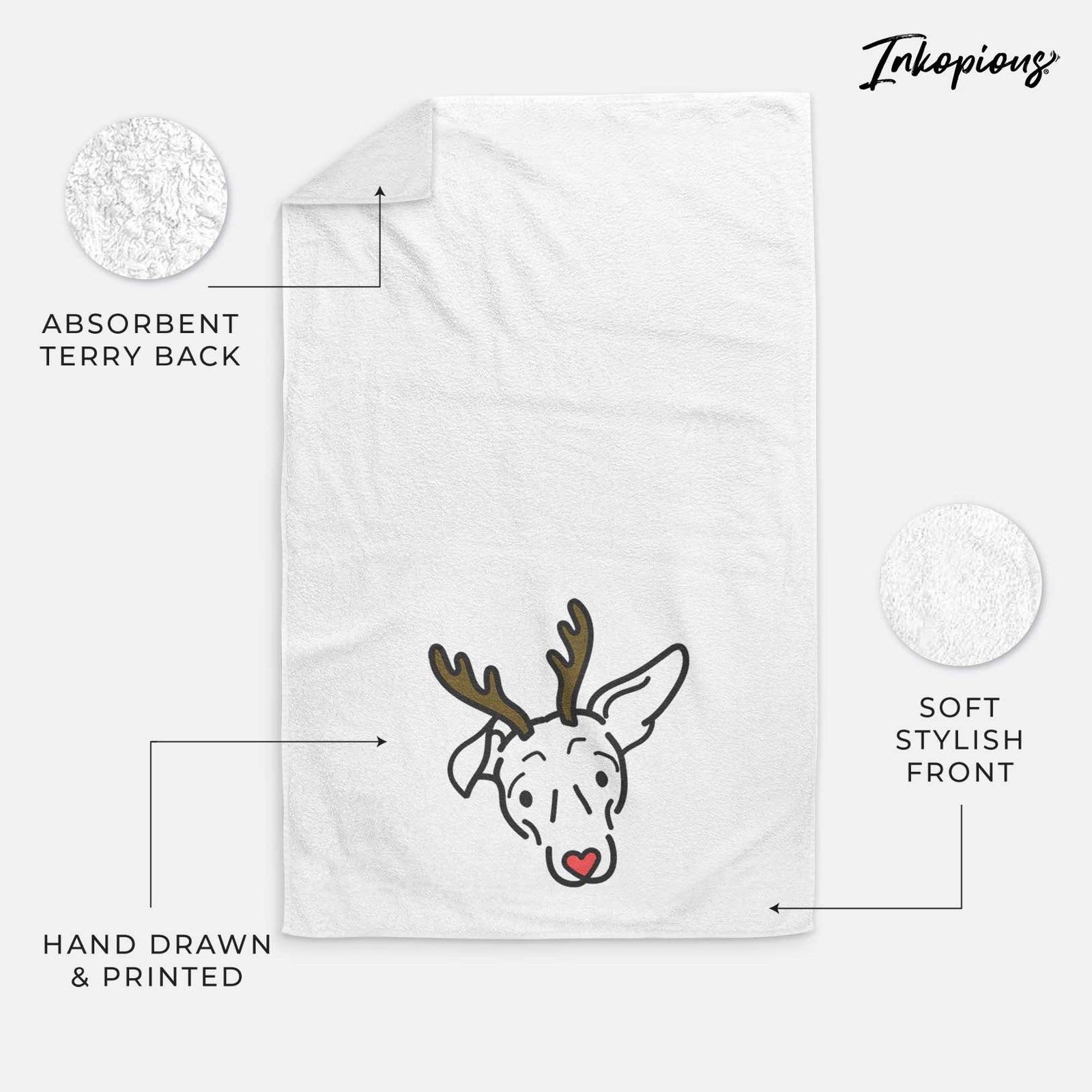 Minimalist line drawing of Millie the Mixed Breed with reindeer antlers and a red nose on a decorative hand towel