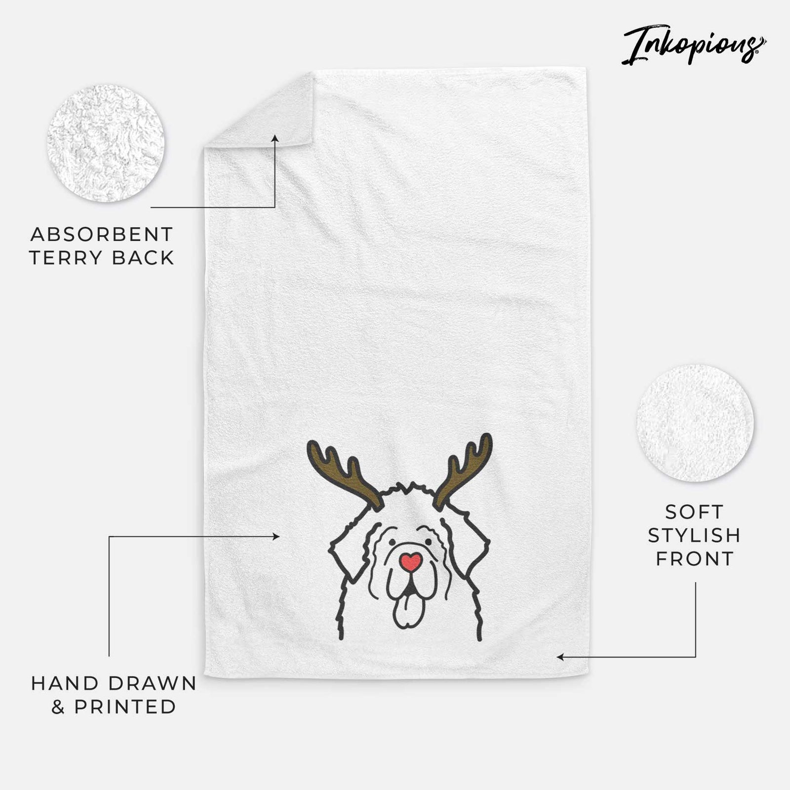 Minimalist line drawing of a Newfoundland with reindeer antlers and a red nose on a decorative hand towel