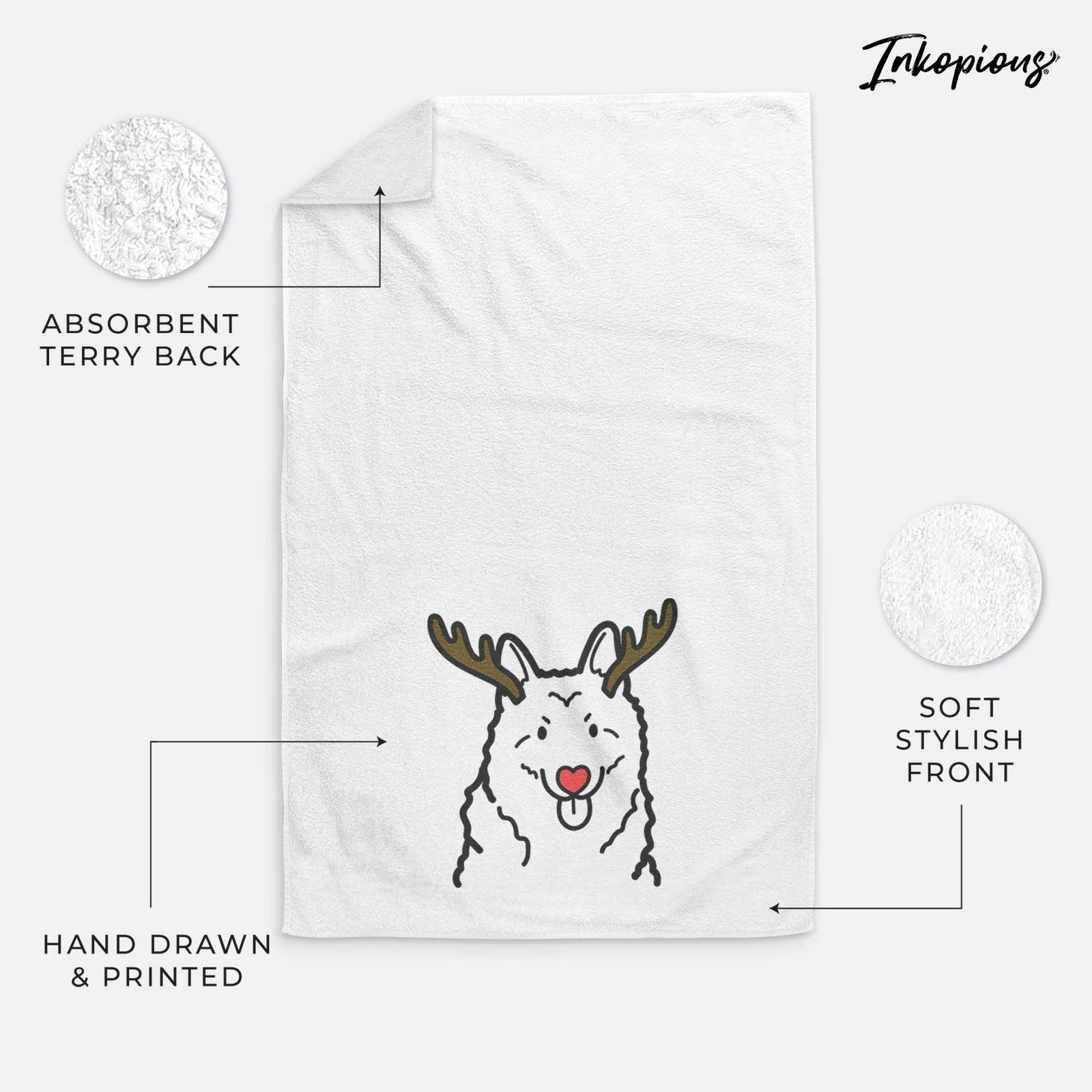 Minimalist line drawing of a Norwegian Elkhound with reindeer antlers and a red nose on a decorative hand towel