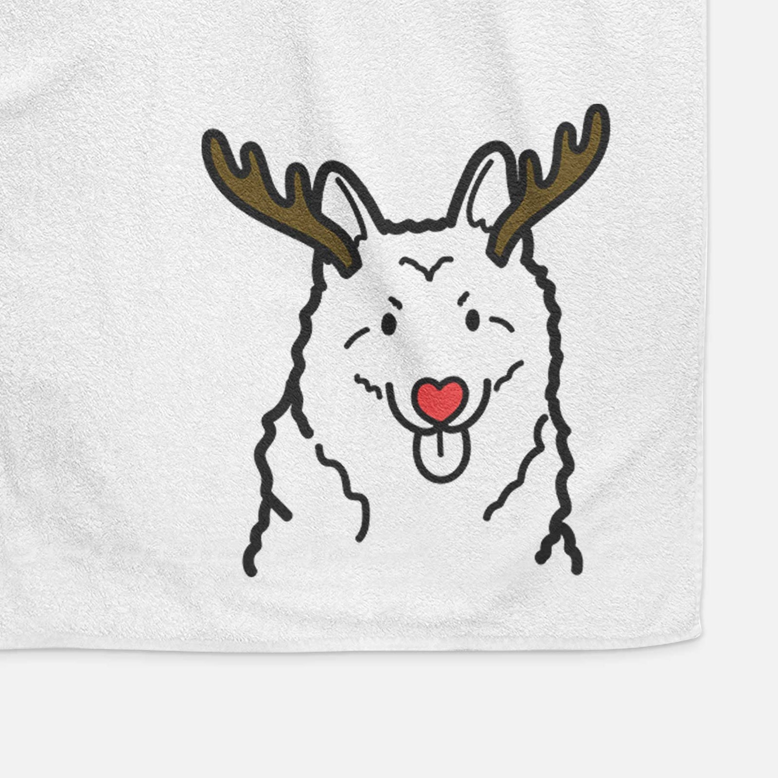 Minimalist line drawing of a Norwegian Elkhound with reindeer antlers and a red nose on a decorative hand towel