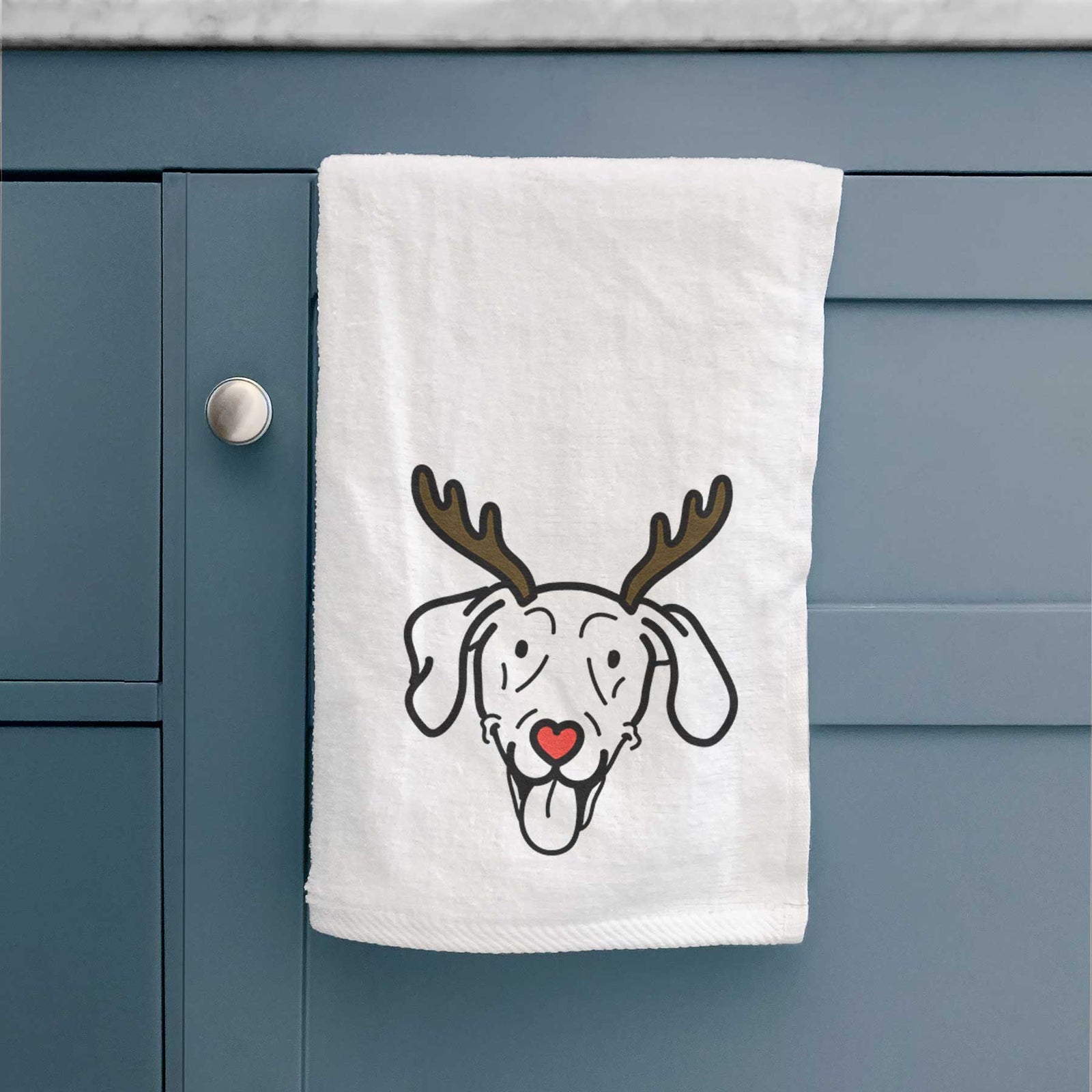 Minimalist line drawing of Paco Lobo the Weimaraner with reindeer antlers and a red nose on a decorative hand towel