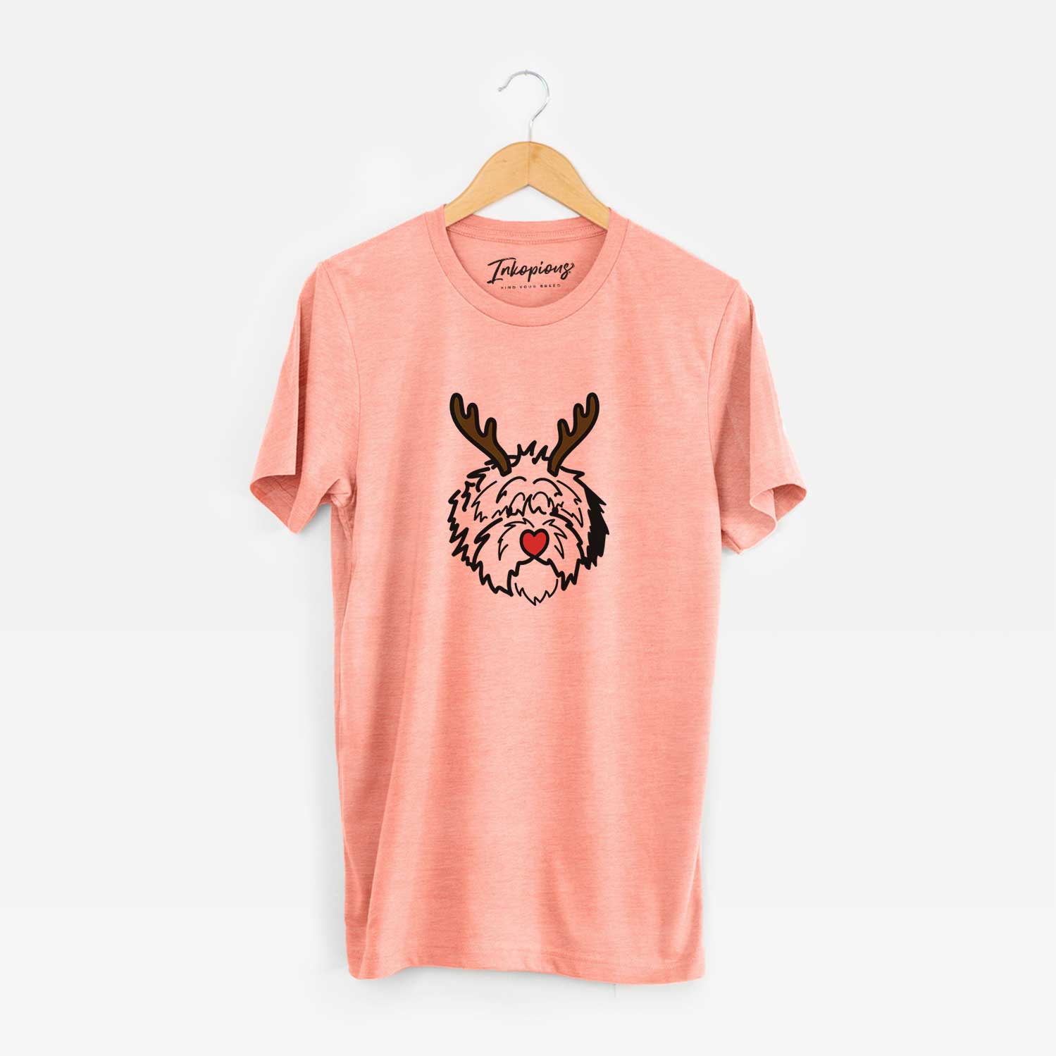 Minimalist line drawing of Penny the Old English Sheepdog with reindeer antlers and a red nose on a Sunset Unisex crewneck