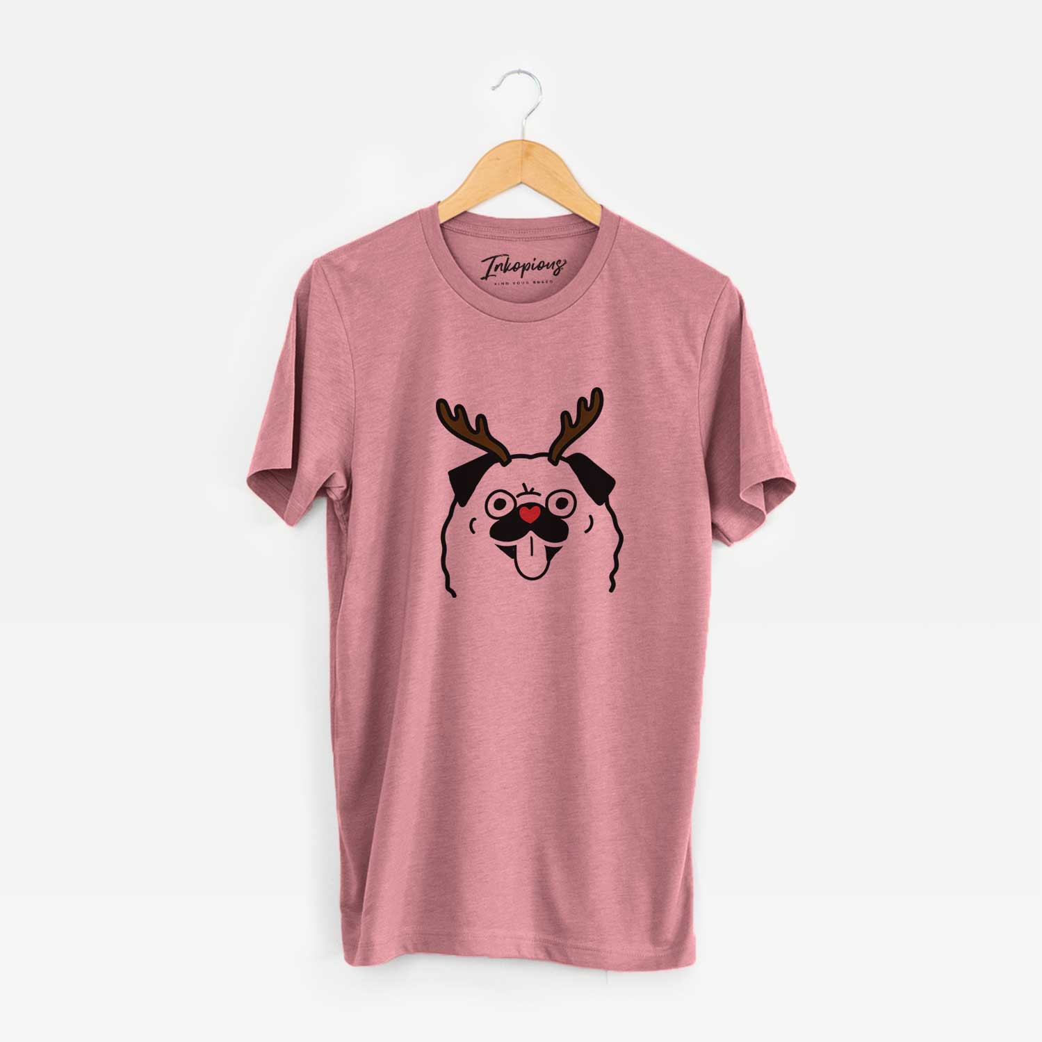 Minimalist line drawing of a Pug with reindeer antlers and a red nose on a Mauve Unisex crewneck