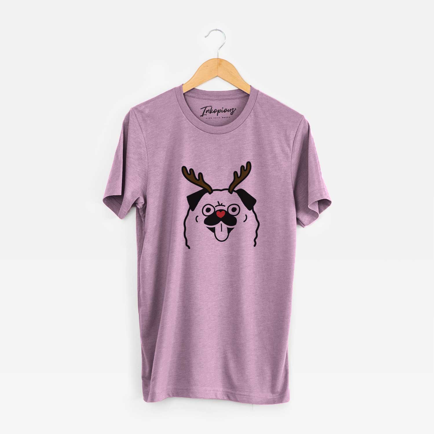 Minimalist line drawing of a Pug with reindeer antlers and a red nose on an Orchid Unisex crewneck