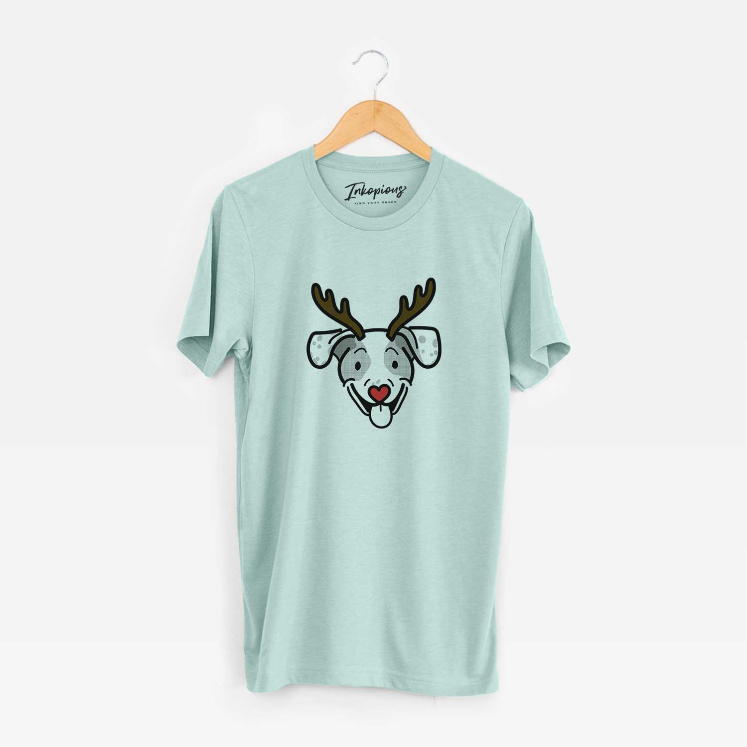 Minimalist line drawing of Roland the Beagle Mix with reindeer antlers and a red nose on a Heather Sage Unisex crewneck