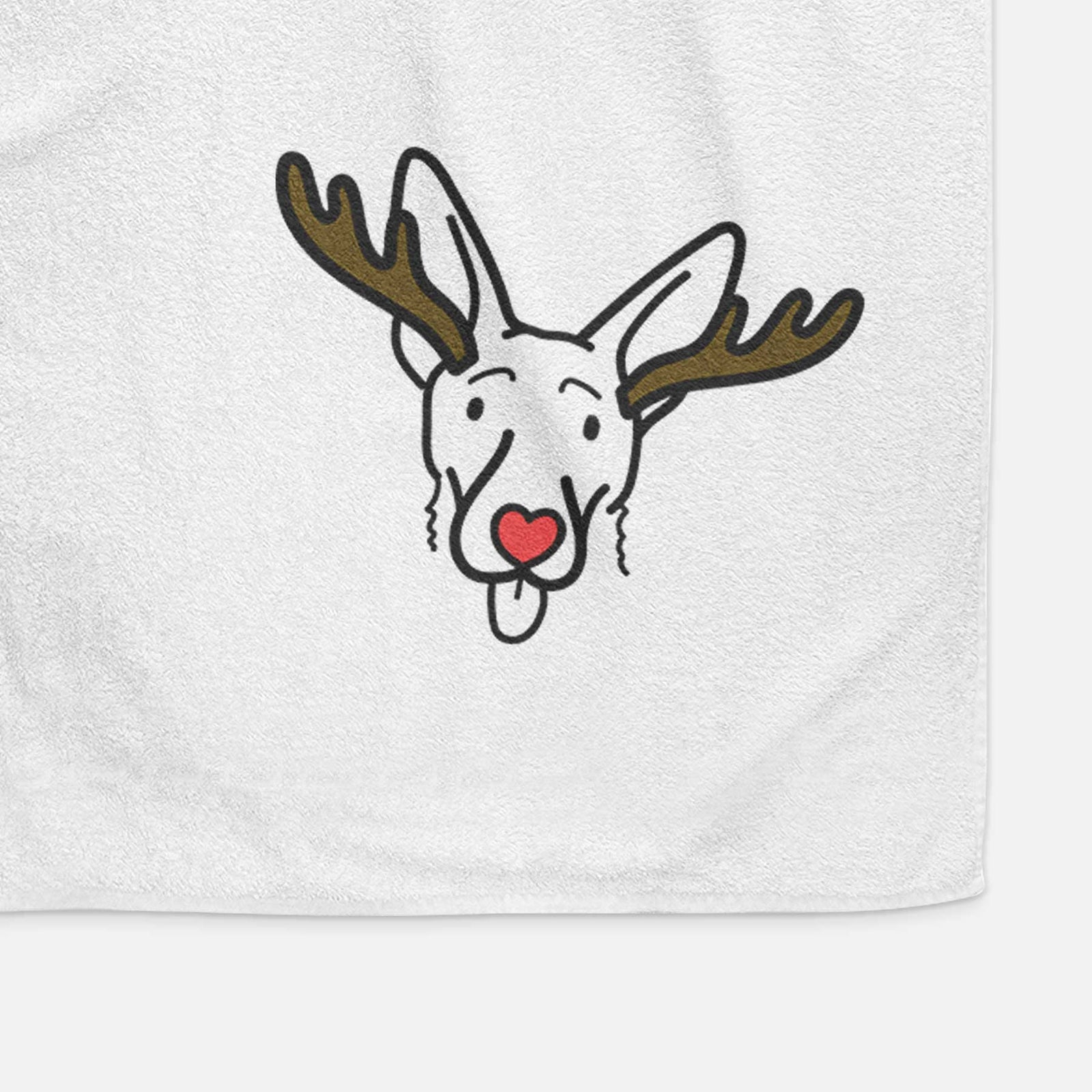 Minimalist line drawing of Rosie the Shepherd Mix with reindeer antlers and a red nose on a decorative hand towel