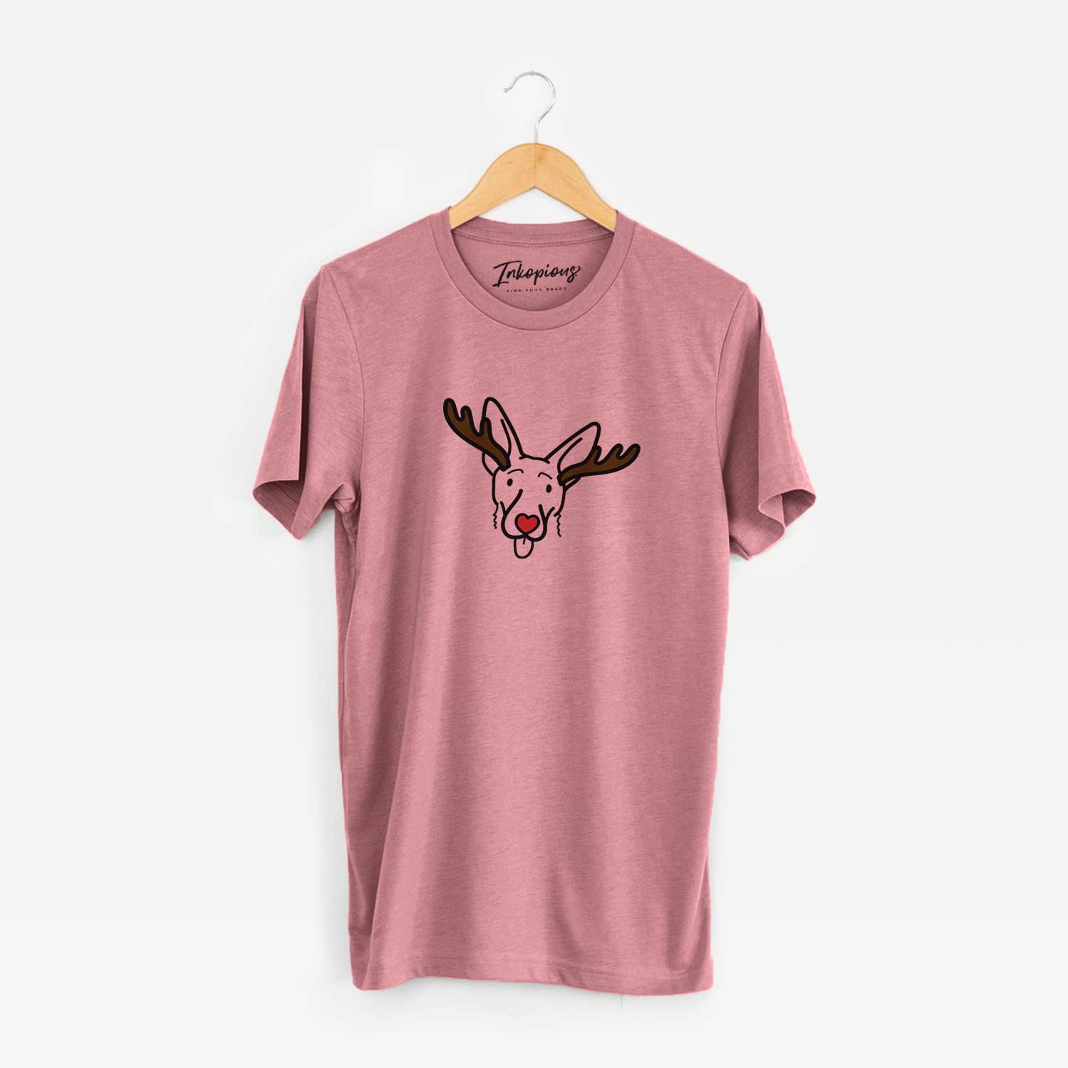 Minimalist line drawing of Rosie the Shepherd Mix with reindeer antlers and a red nose on a Mauve Unisex crewneck