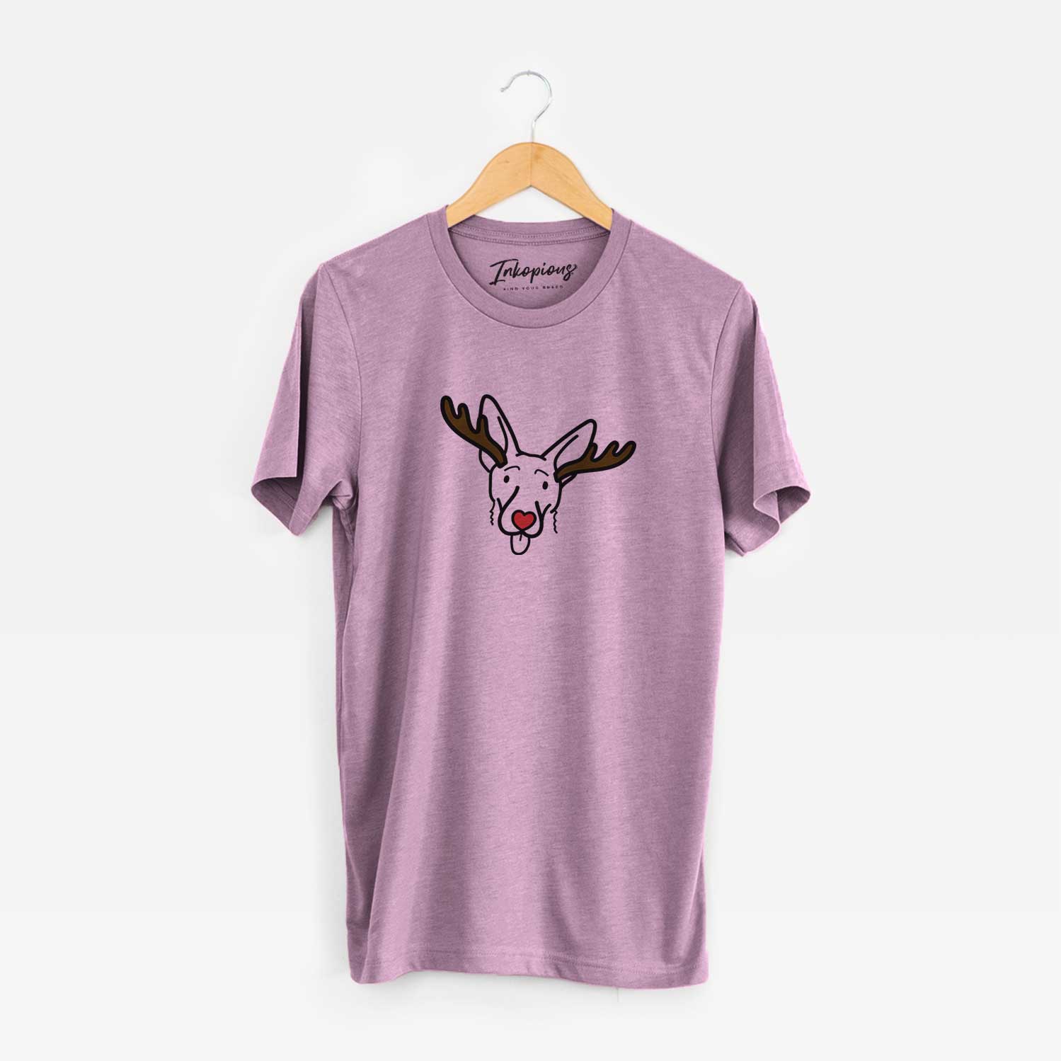 Minimalist line drawing of Rosie the Shepherd Mix with reindeer antlers and a red nose on an Orchid Unisex crewneck