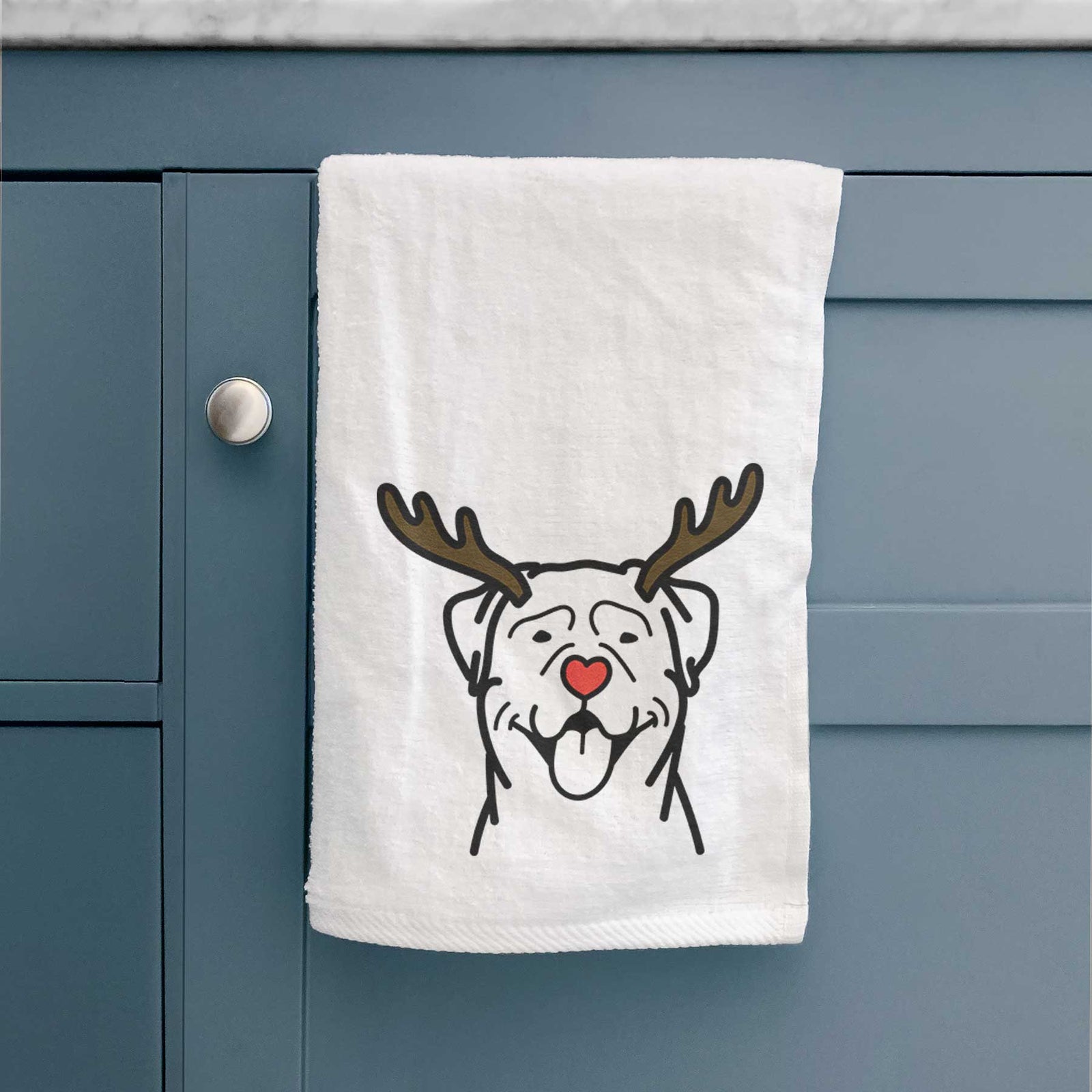 Minimalist line drawing of a Rottweiler with reindeer antlers and a red nose on a decorative hand towel