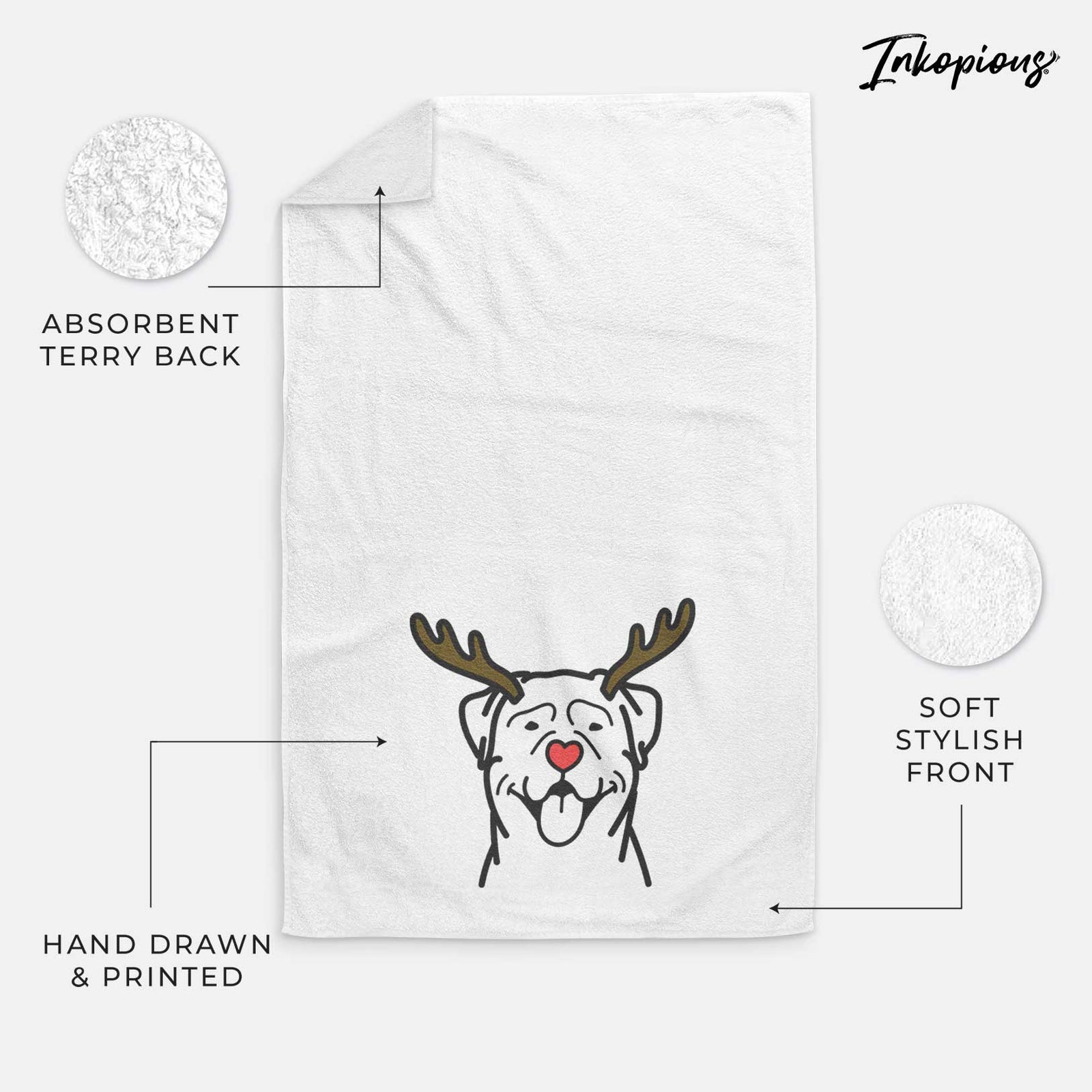 Minimalist line drawing of a Rottweiler with reindeer antlers and a red nose on a decorative hand towel