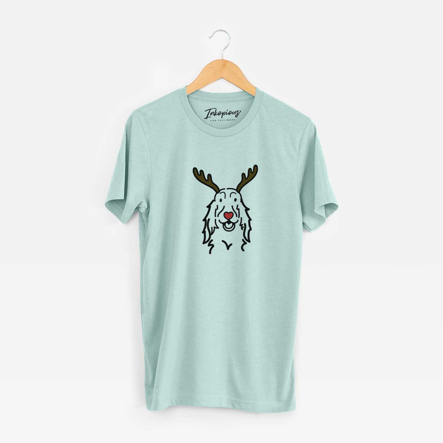 Minimalist line drawing of a Setter with reindeer antlers and a red nose on a Heather Sage Unisex crewneck