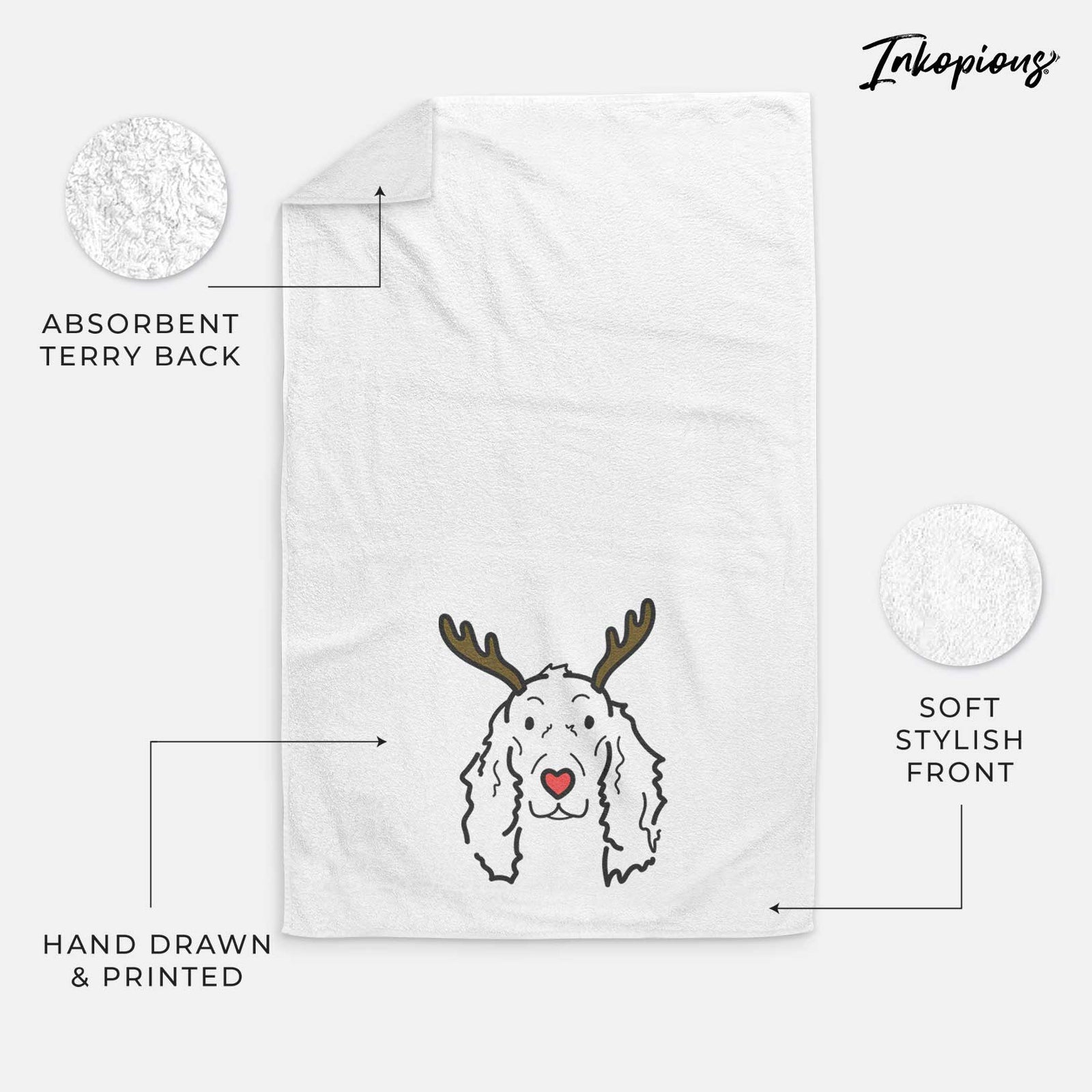 Minimalist line drawing of Seven the Irish Setter with reindeer antlers and a red nose on a decorative hand towel