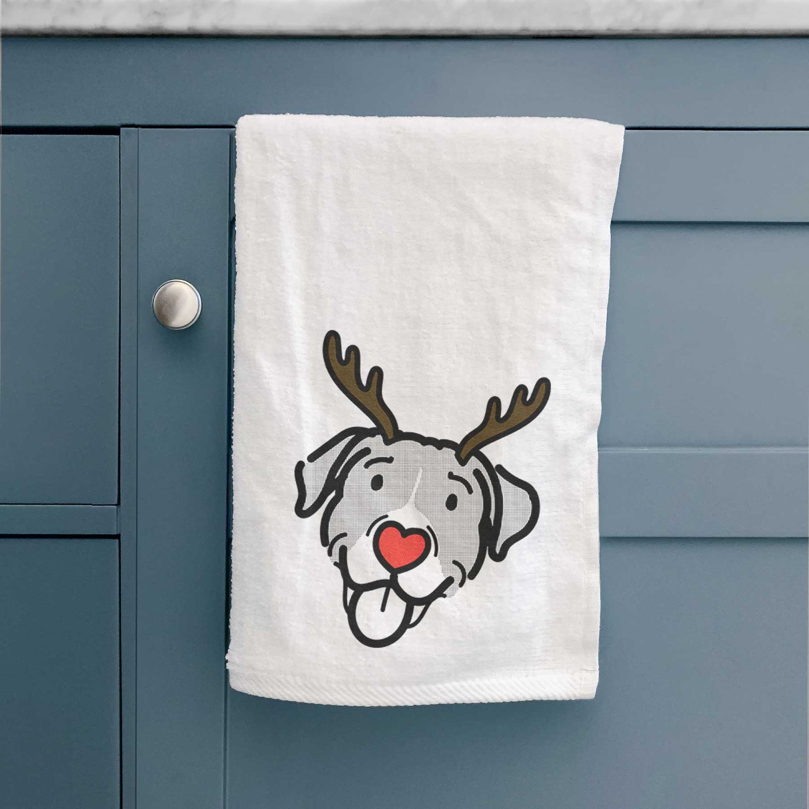 Minimalist line drawing of Shadow the Pitbull Mix with reindeer antlers and a red nose on a decorative hand towel