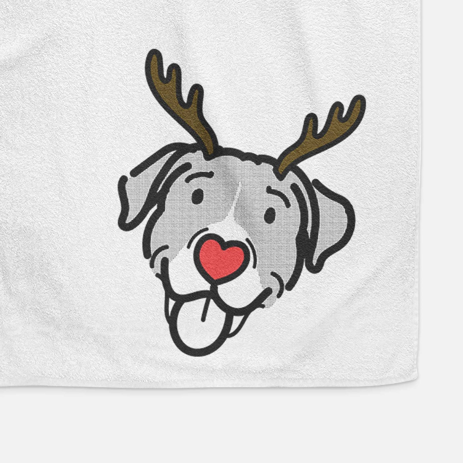Minimalist line drawing of Shadow the Pitbull Mix with reindeer antlers and a red nose on a decorative hand towel