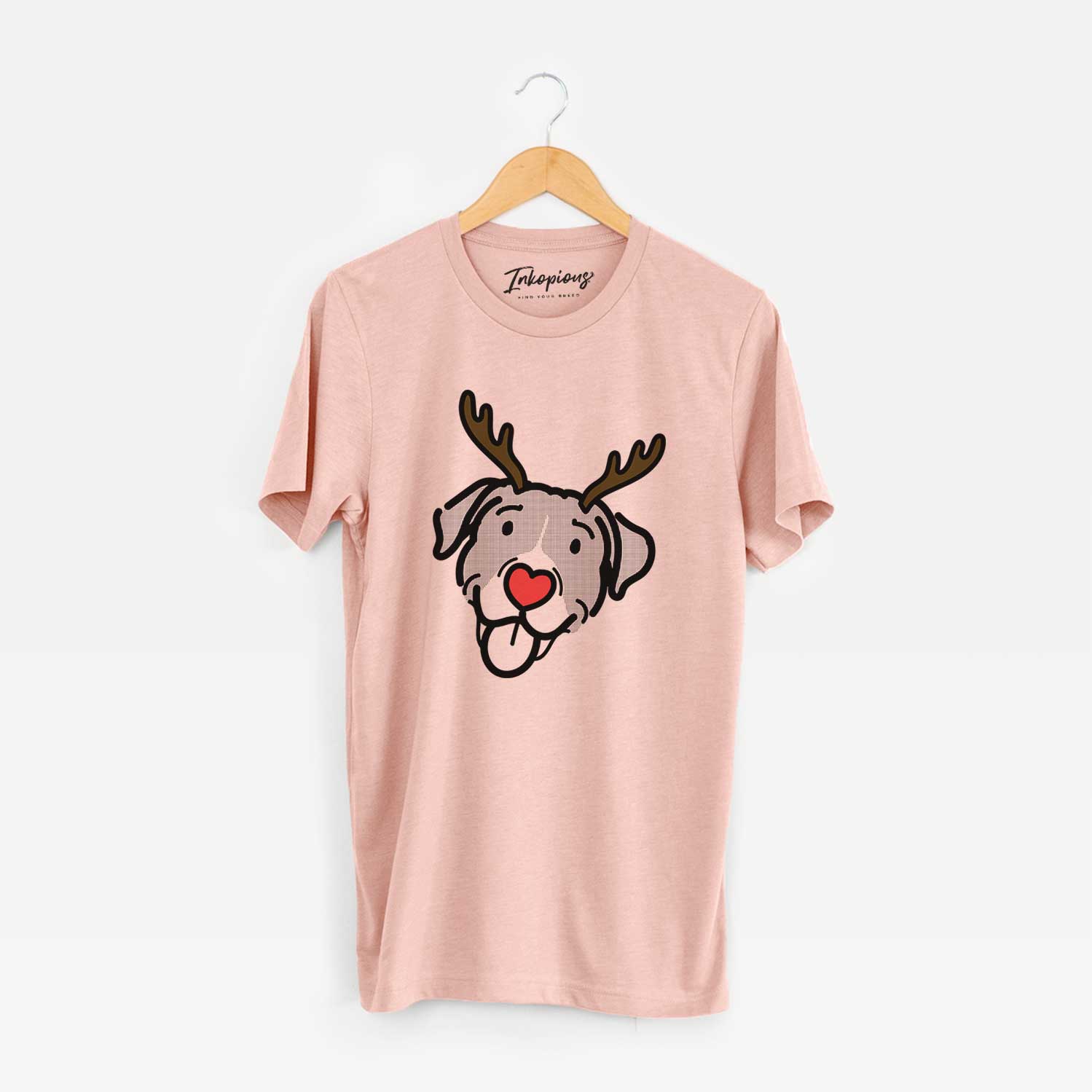 Minimalist line drawing of Shadow the Pitbull Mix with reindeer antlers and a red nose on a Peach Unisex crewneck