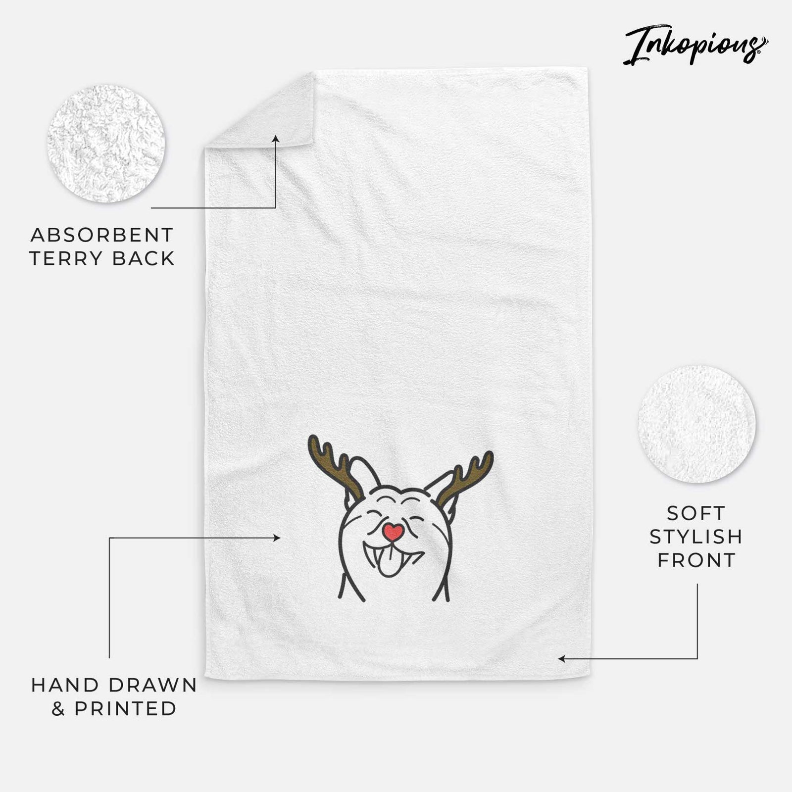 Minimalist line drawing of a Shiba Inu with reindeer antlers and a red nose on a decorative hand towel