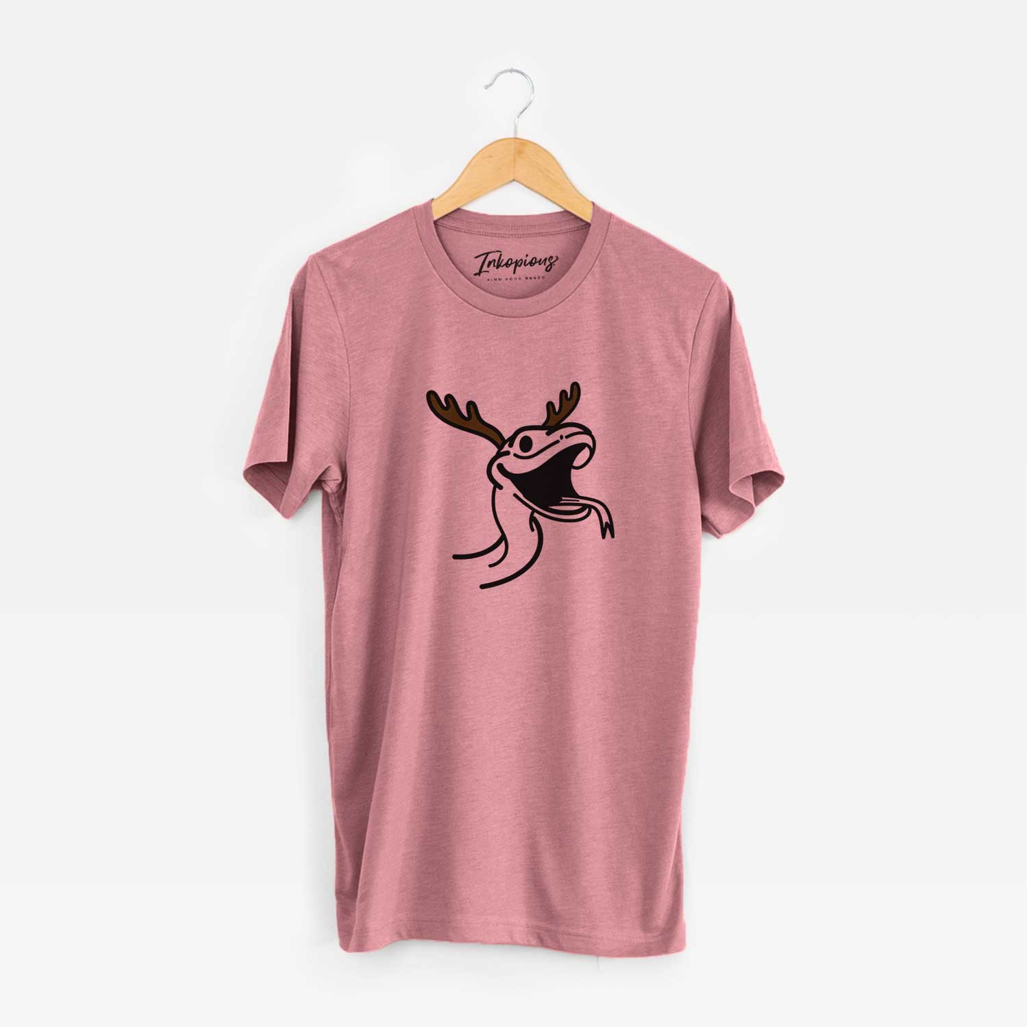 Minimalist line drawing of Spike the Snake with reindeer antlers and a red nose on a Mauve Unisex crewneck