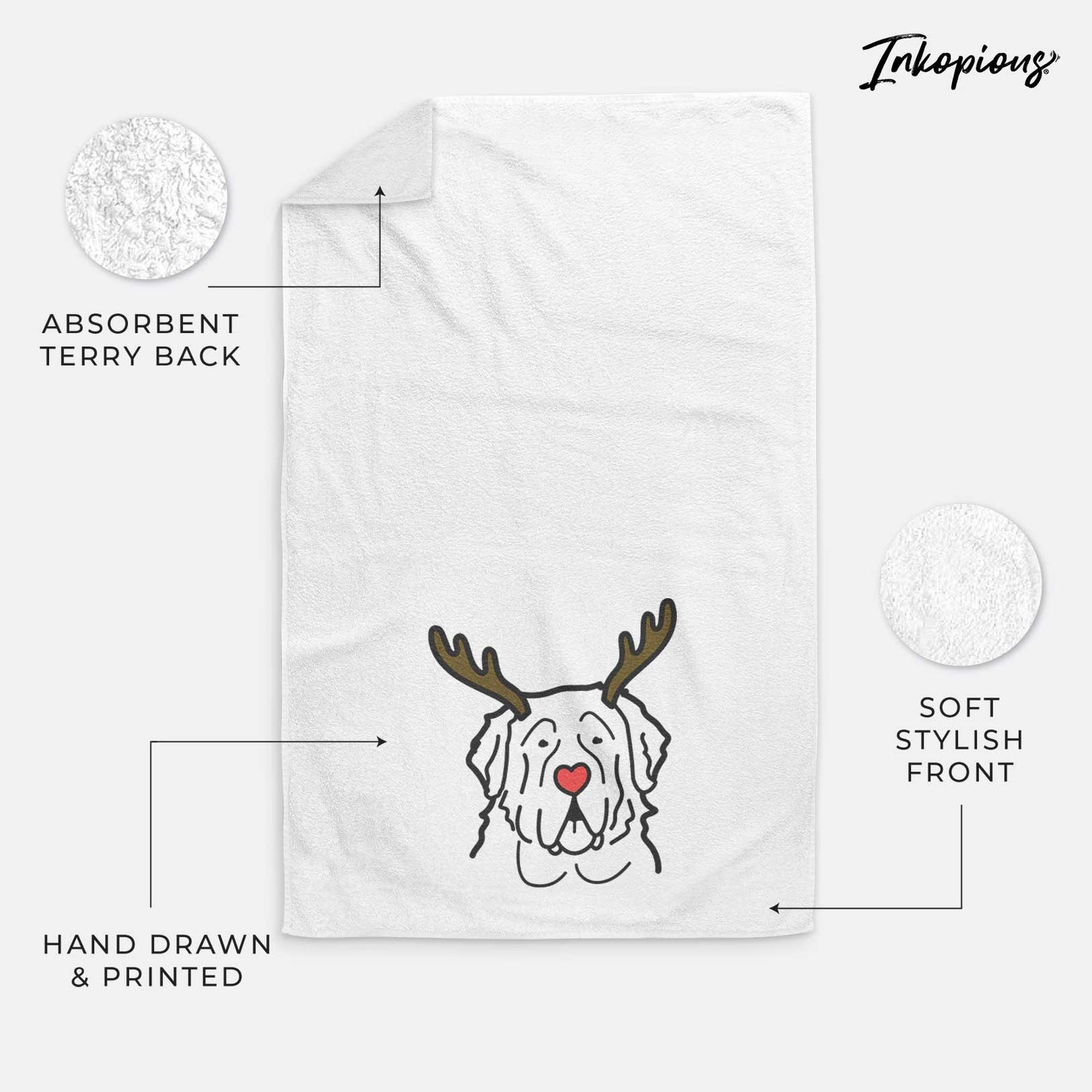 Minimalist line drawing of a Saint Bernard with reindeer antlers and a red nose on a decorative hand towel