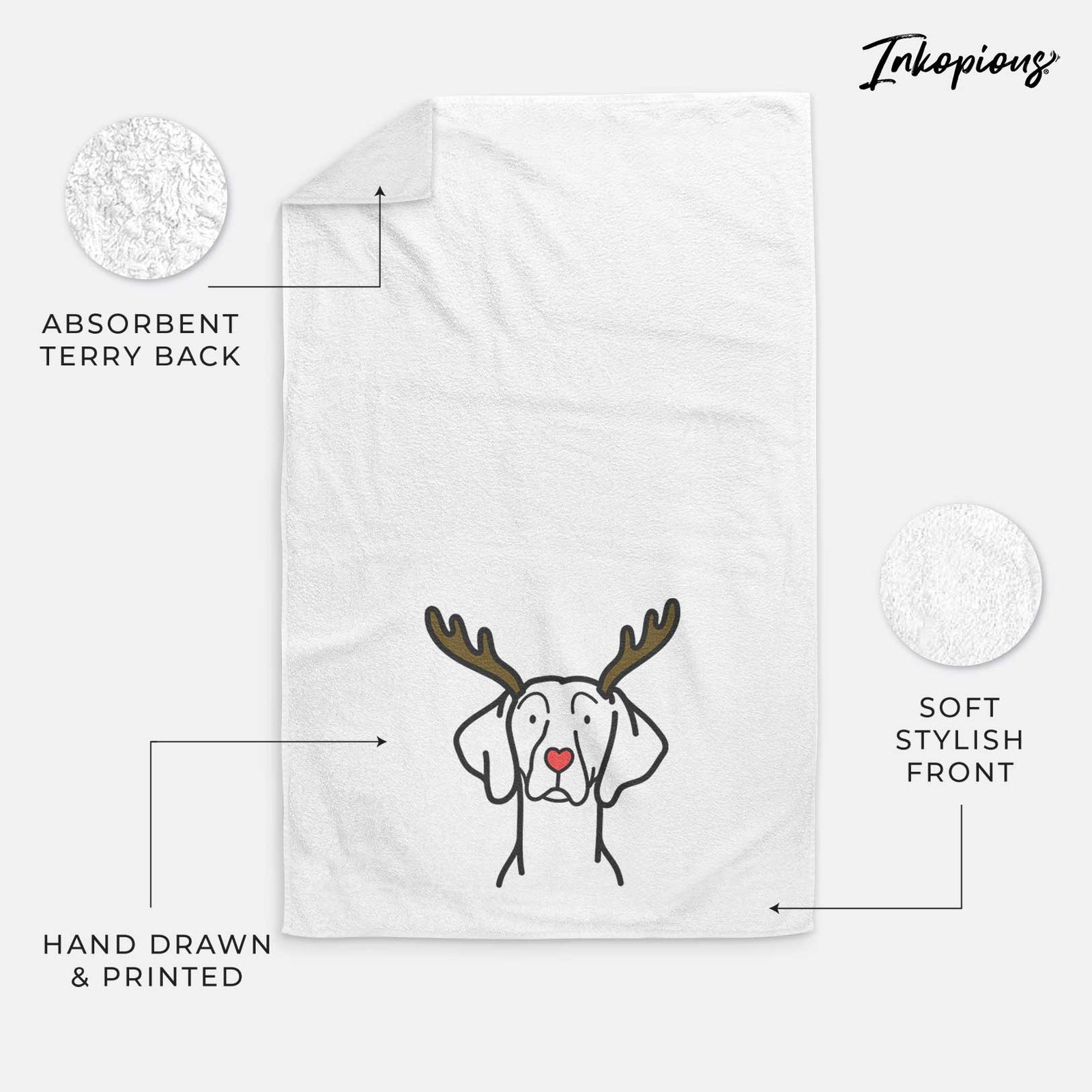 Minimalist line drawing of a Weimaraner with reindeer antlers and a red nose on a decorative hand towel