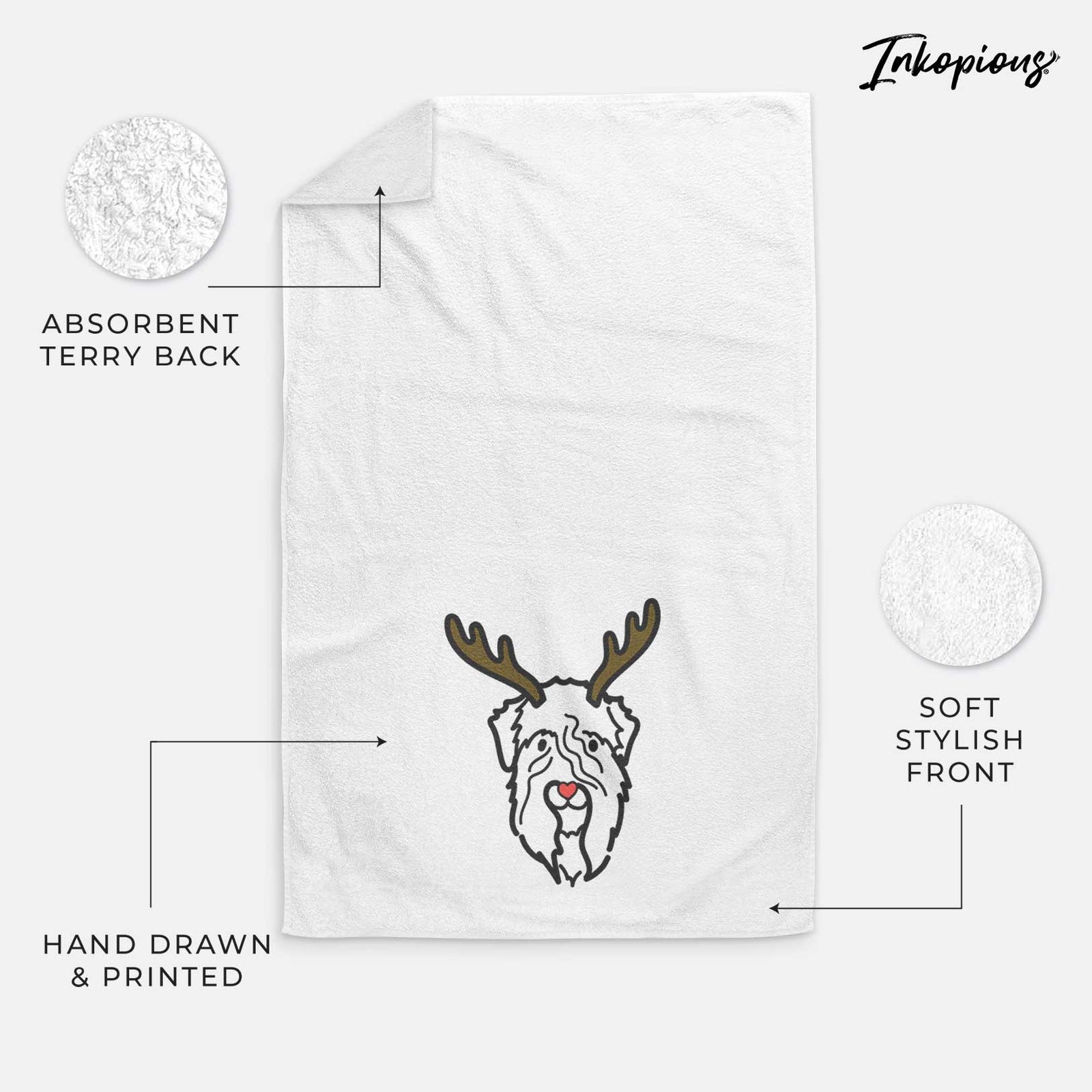 Minimalist line drawing of a Soft Coated Wheaten Terrier with reindeer antlers and a red nose on a decorative hand towel