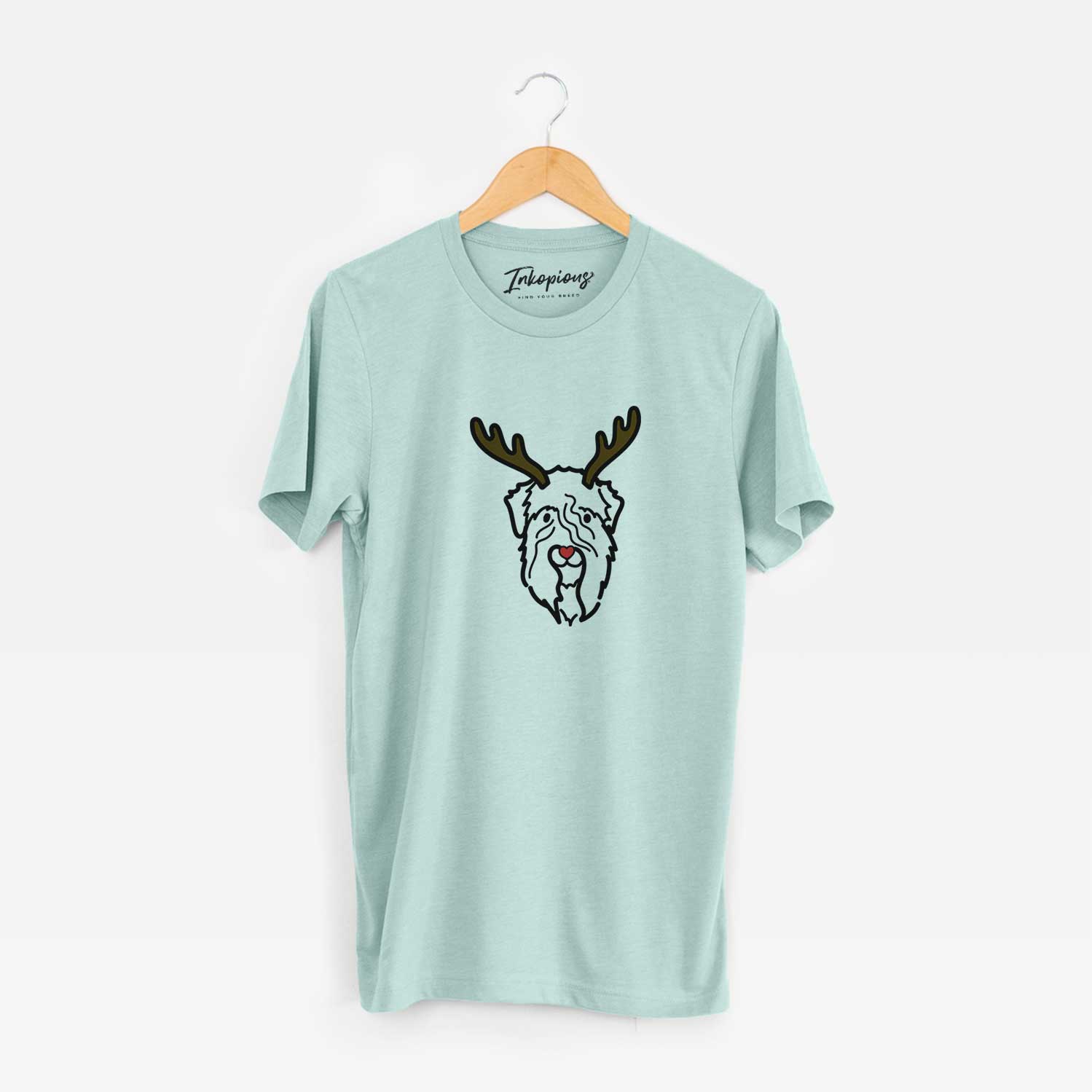 Minimalist line drawing of a Soft Coated Wheaten Terrier with reindeer antlers and a red nose on a Heather Sage Unisex crewneck