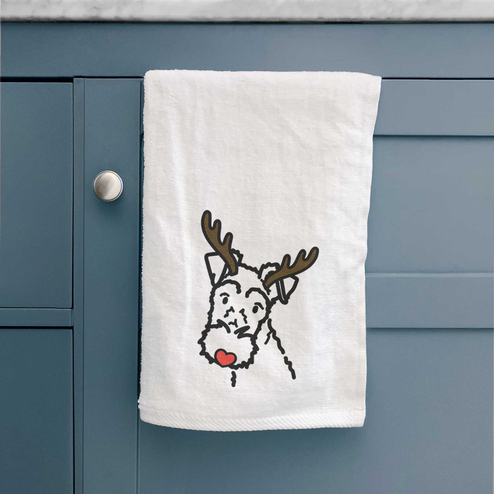 Minimalist line drawing of a Wire Fox Terrier with reindeer antlers and a red nose on a decorative hand towel