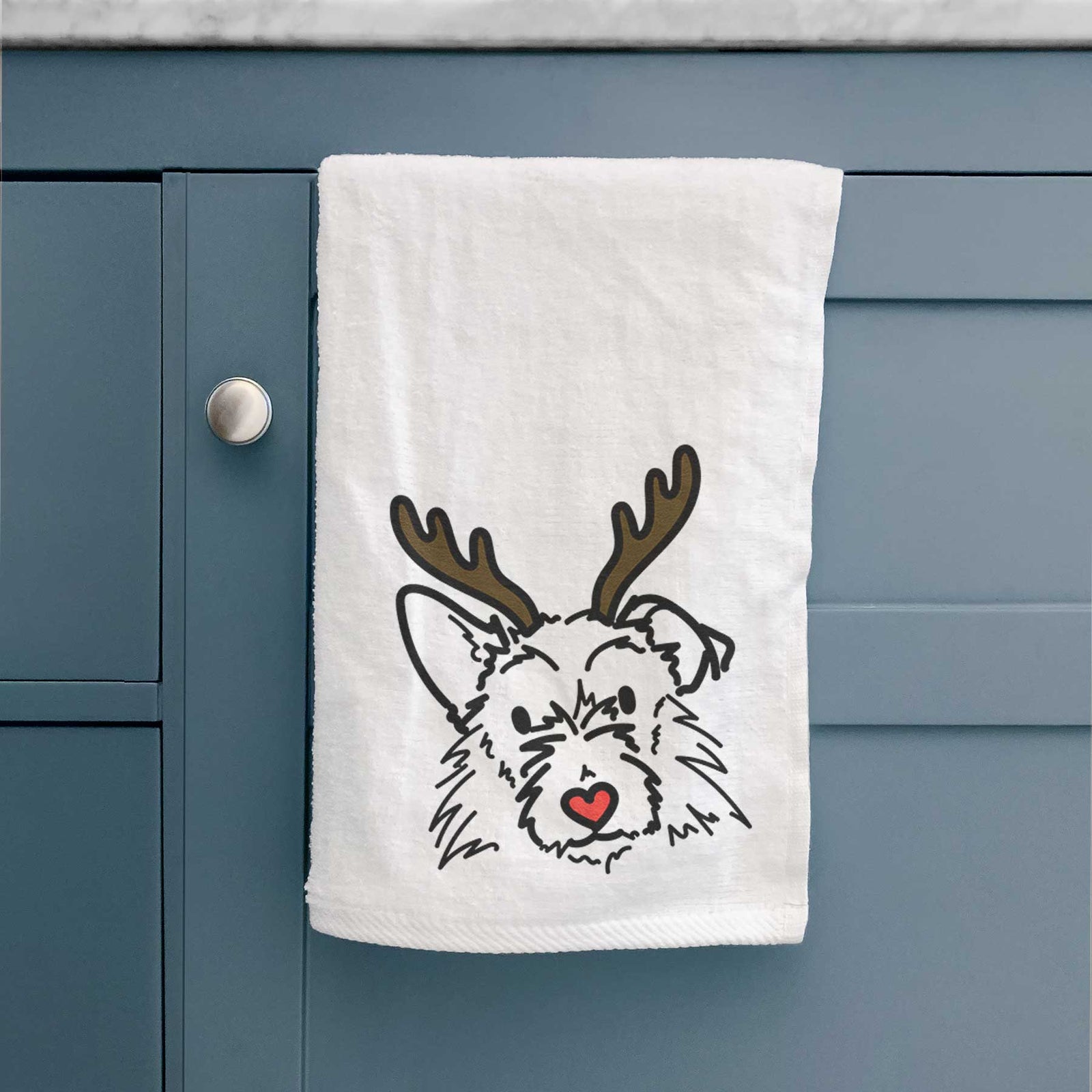 Minimalist line drawing of Ziggy the Terrier Mix with reindeer antlers and a red nose on a decorative hand towel
