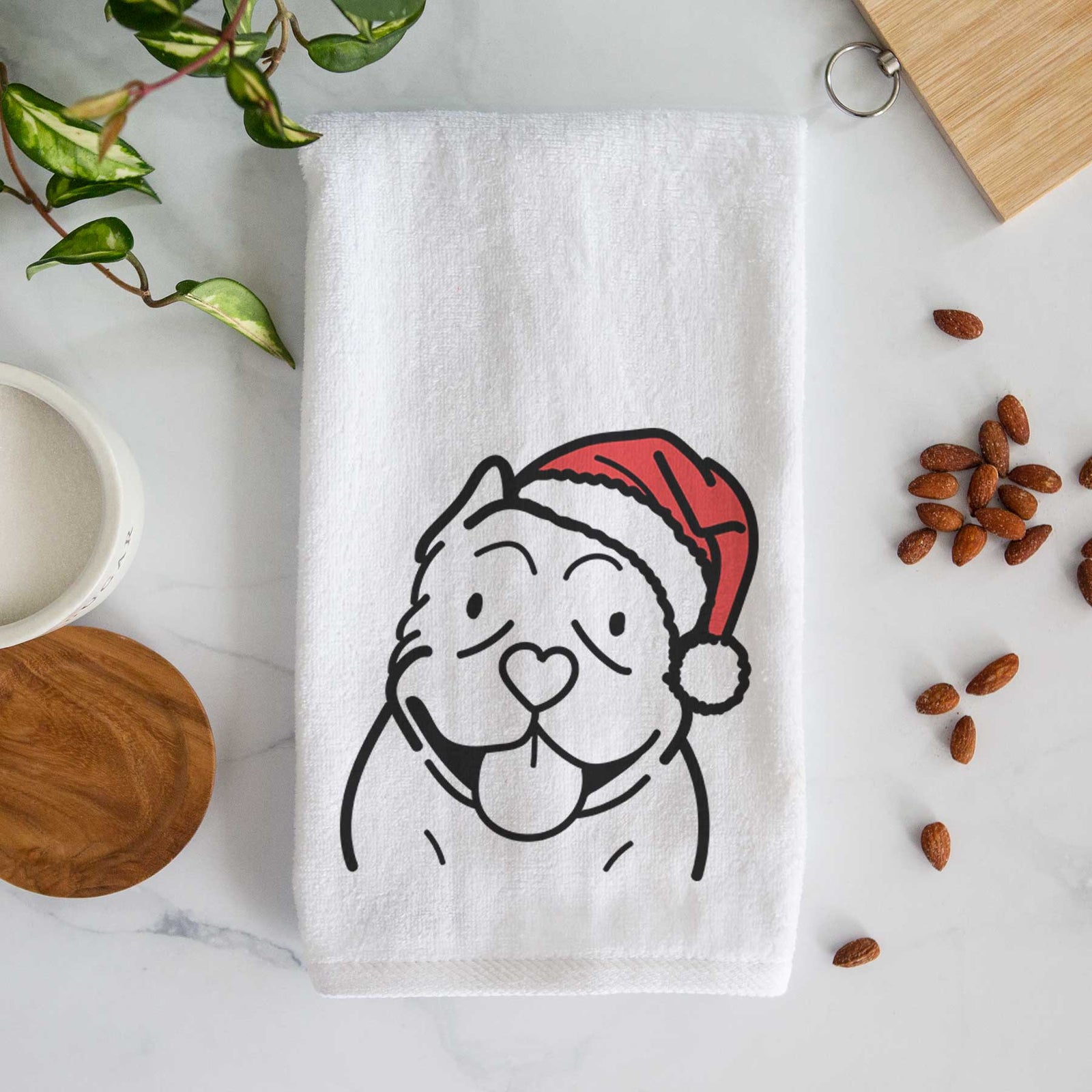 Minimalist line drawing of an American Bully wearing a Santa hat on a decorative hand towel